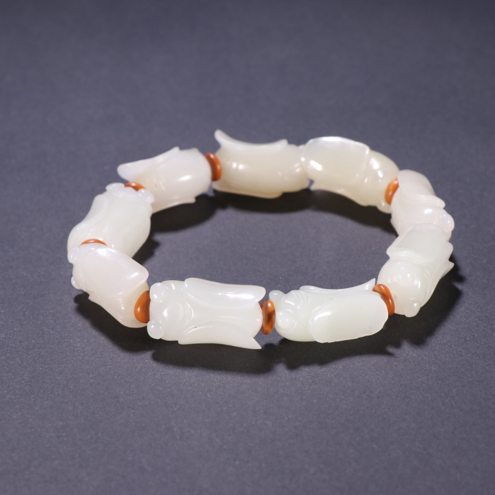 An Exquisite White Jade Cicada Bead Bracelet: An Exquisite White Jade Cicada Bead Bracelet,China Qing Dynasty,Dimensions:0.8inx0.5in,Weight:37.6g,白玉玉蝉手串,中国清代