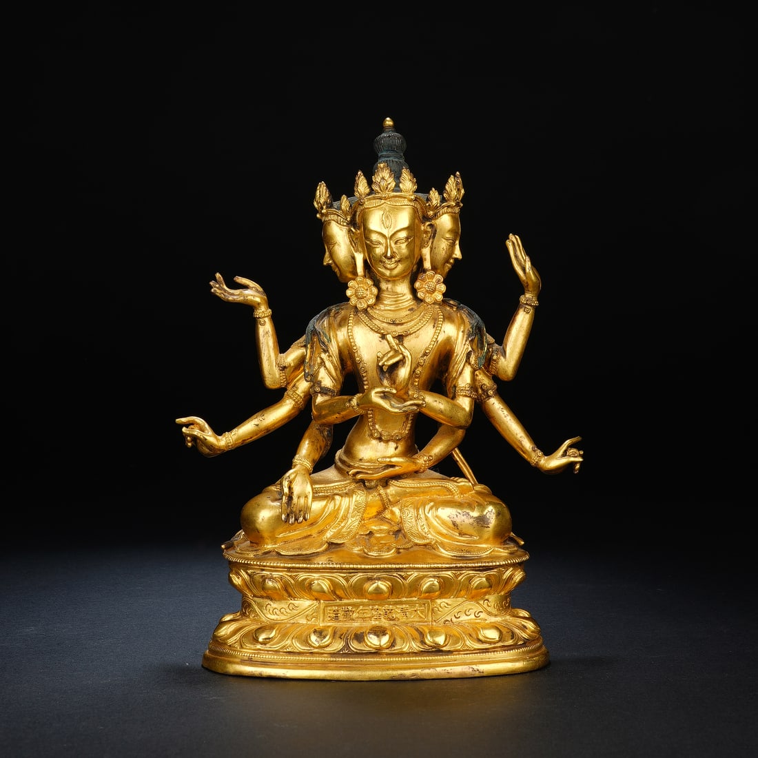 An Exquisite Gilt Copper Seated Statue Of Eight-Armed Usnishavijaya: An Exquisite Gilt Copper Seated Statue Of Eight-Armed Usnishavijaya,Qing Dynasty,China,Six-Character Qianlong Mark,Dimensions:5.5inx3.1inx7.1in,Weight:1560g,铜鎏金八臂