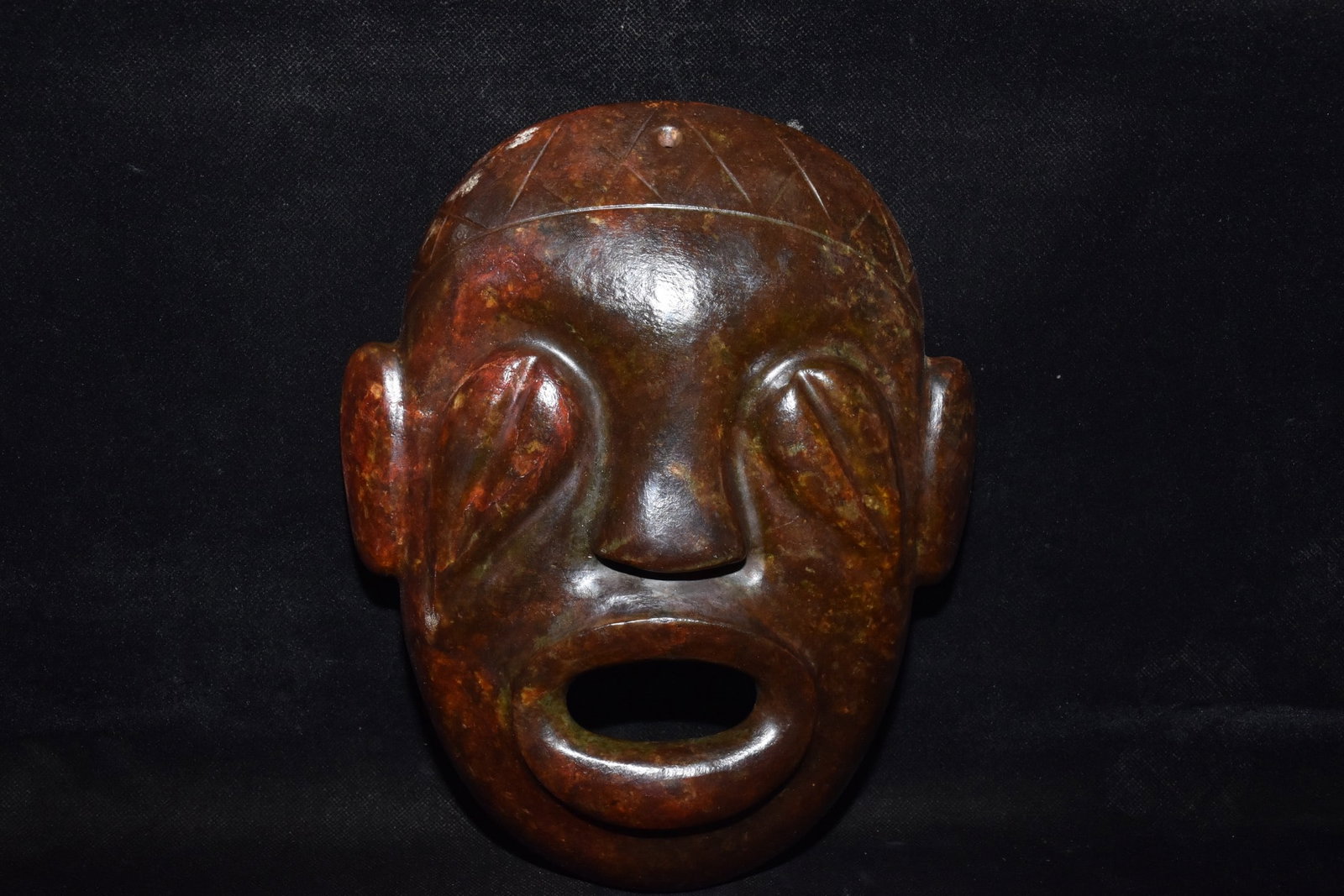 A Fine White Jade Human?Face Mask: A Fine White Jade Human‑Face Mask,Hongshan Culture,Dimensions:7.5inx 9.8in,Weight:1380g,白玉人面面具,红山文化