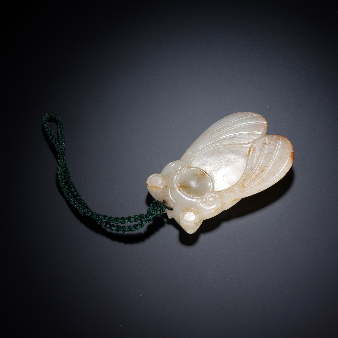 An Exquisite White Jade Cicada Pendant: An Exquisite White Jade Cicada Pendant,China Han Dynasty,Dimensions:2.7inx4.1inx0.7in,Weight:187g,白玉玉蝉佩,中国汉代