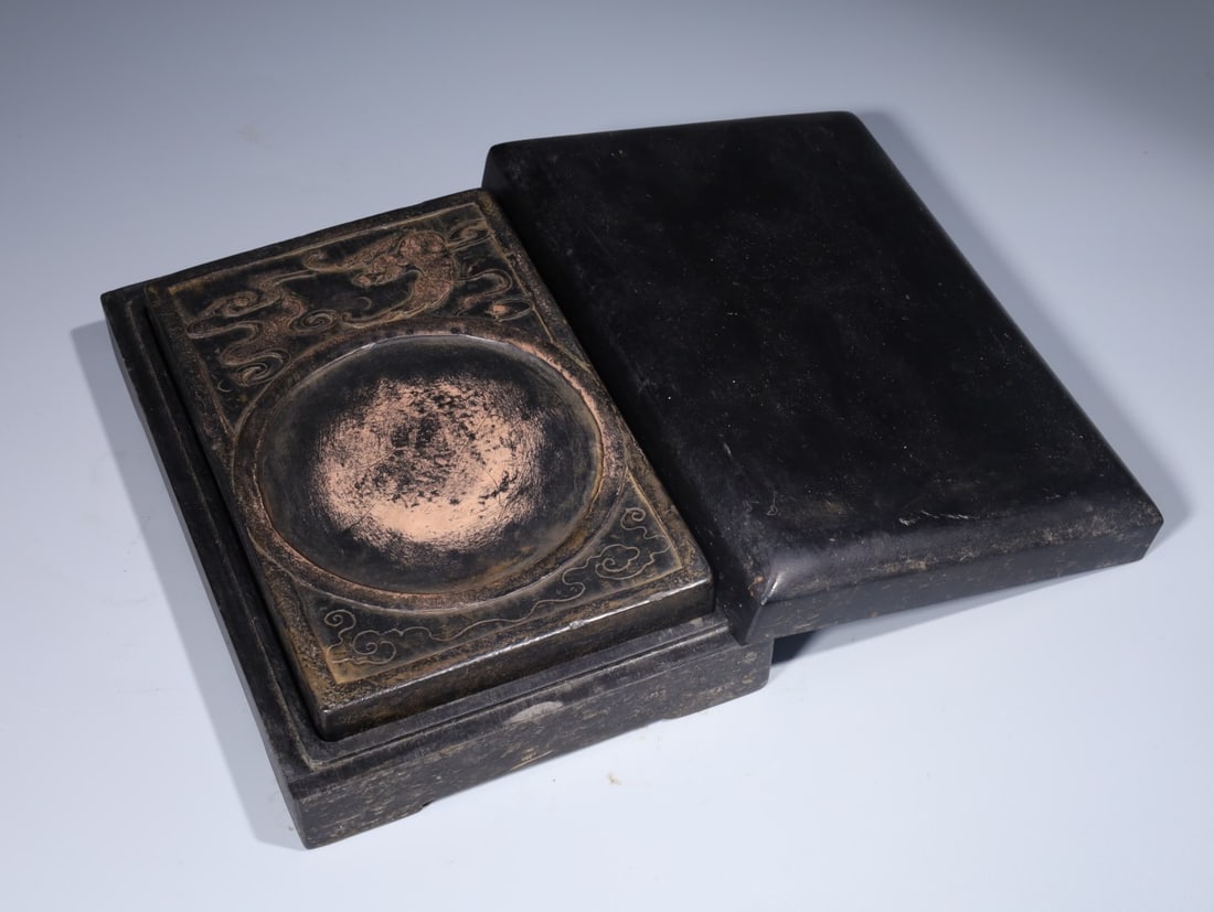 A Fine Square Duanshi Inkstone With Cloud?And?Bat Motif: A Fine Square Duanshi Inkstone With Cloud‑And‑Bat Motif,China,Qing Dynasty,Dimensions:6.1inx4.1inx0.8in,端石云蝠纹方砚,中国清