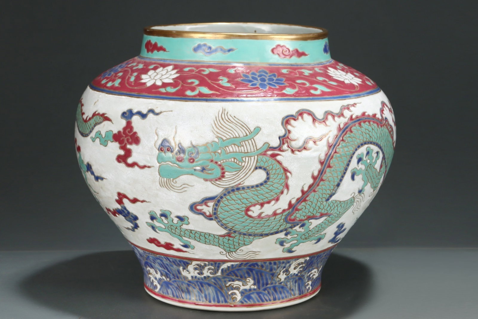 An Exquisite Fahua Glazed Jar Gilded With Interlocking Lotus,Sea Water,Cloud And Dragon Patterns: An Exquisite Fahua Glazed Jar Gilded With Interlocking Lotus,Sea Water,Cloud And Dragon Patterns,China Ming Dynasty,Four-Character Jingtai Mark,Size:11inx13.4in,珐华彩缠枝