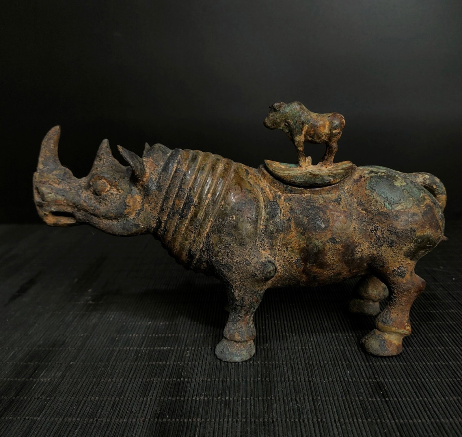 A Fine Bronze Rhinoceros?Shaped Vessel: A Fine Bronze Rhinoceros‑Shaped Vessel,Chinese Warring States Period,Dimensions:9.1inx5.1in,Weight:1300g,青铜犀牛尊,中国战国时期