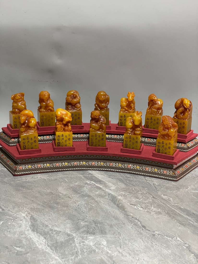 A Fine Set Of Tianhuang Stone Seals With Twelve Chinese Zodiac Animal Knobs: A Fine Set Of Tianhuang Stone Seals With Twelve Chinese Zodiac Animal Knobs,Qing Dynasty Of China,With Inscription,Dimensions:1.2inx1.2inx2.8in,Weight:1482g,一套田黄石