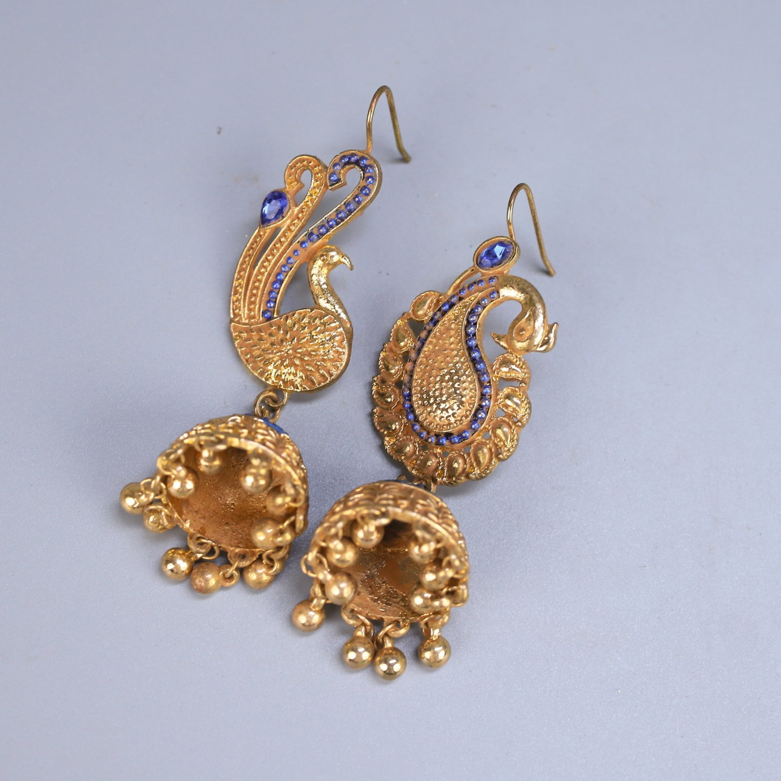 A Pair Of Exquisite Gilt Bronze Bell Earrings Inlaid With Sapphires And Peacock Patterns: A Pair Of Exquisite Gilt Bronze Bell Earrings Inlaid With Sapphires And Peacock Patterns,China,Qing Dynasty,Dimensions:3.5inx1.4in,Weight:34g,一对铜鎏金镶蓝&#