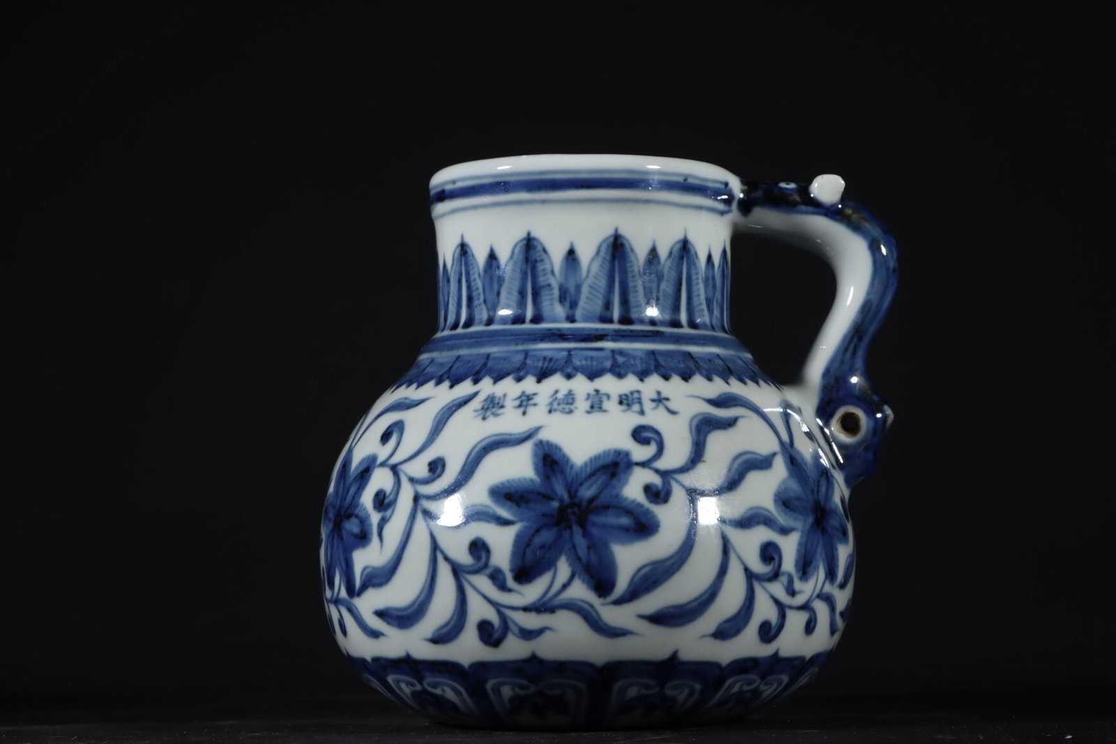 An Exquisite Blue And White Ewer Decorated With Floral Designs: An Exquisite Blue And White Ewer Decorated With Floral Designs,Ming Dynasty,China,Xuande Six-character