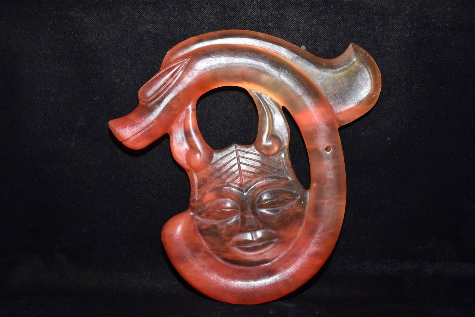 A Fine Red Crystal Dragon Ornament: A Fine Red Crystal Dragon Ornament,Hongshan Culture,Dimensions:10.2inx 9.8in,Weight:1620g,红水晶龙摆件,红山文化