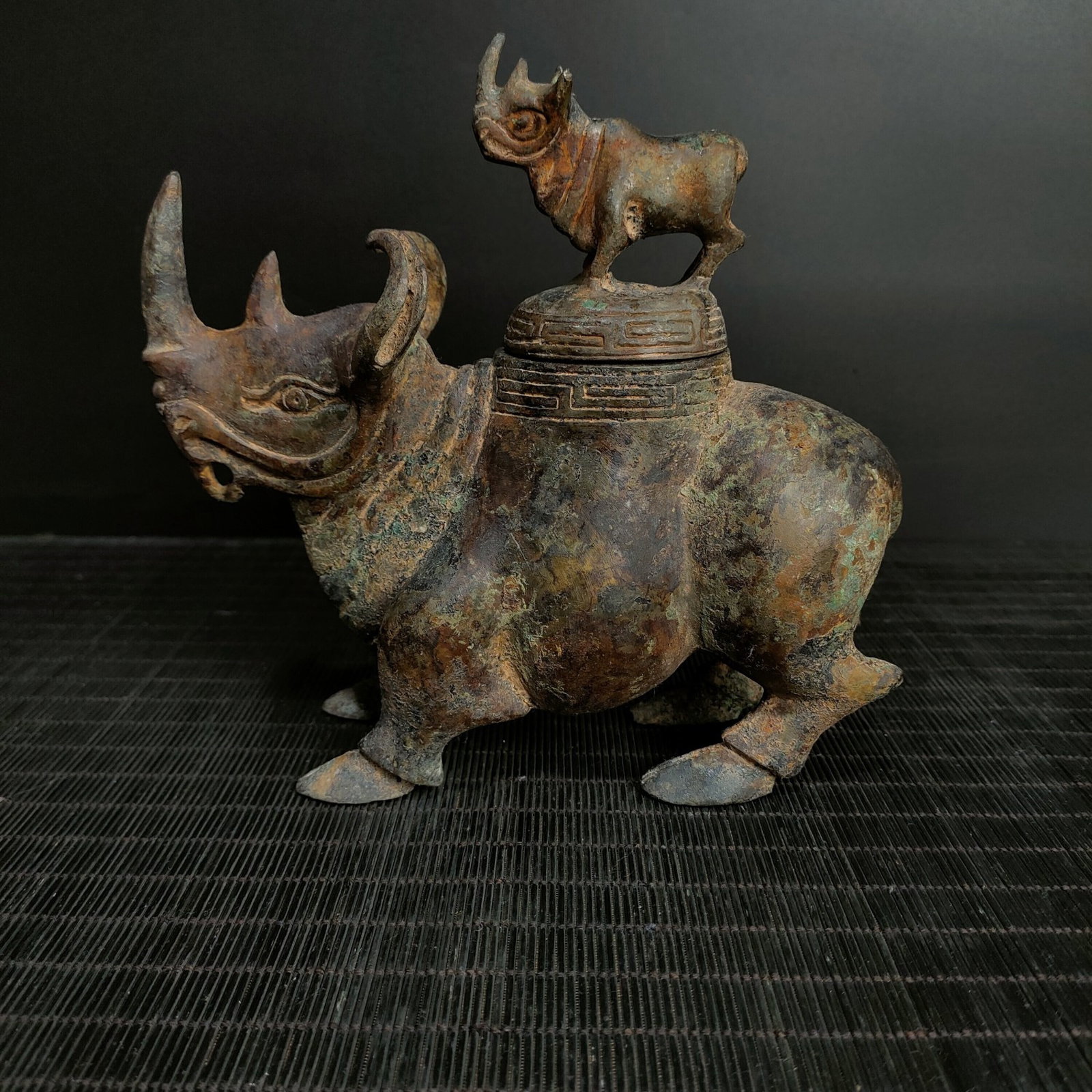 A Fine Bronze Rhinoceros?Shaped Vessel: A Fine Bronze Rhinoceros‑Shaped Vessel,Chinese Warring States Period,Dimensions:7.5inx7.1in,Weight:1400g,青铜犀牛尊,中国战国时期