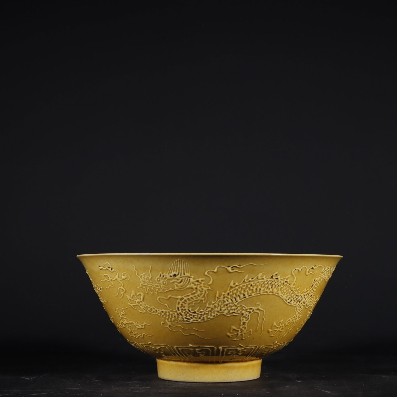 An Exquisite Yellow Glaze Bowl Molded With Dragon Patterns (1 of 9)