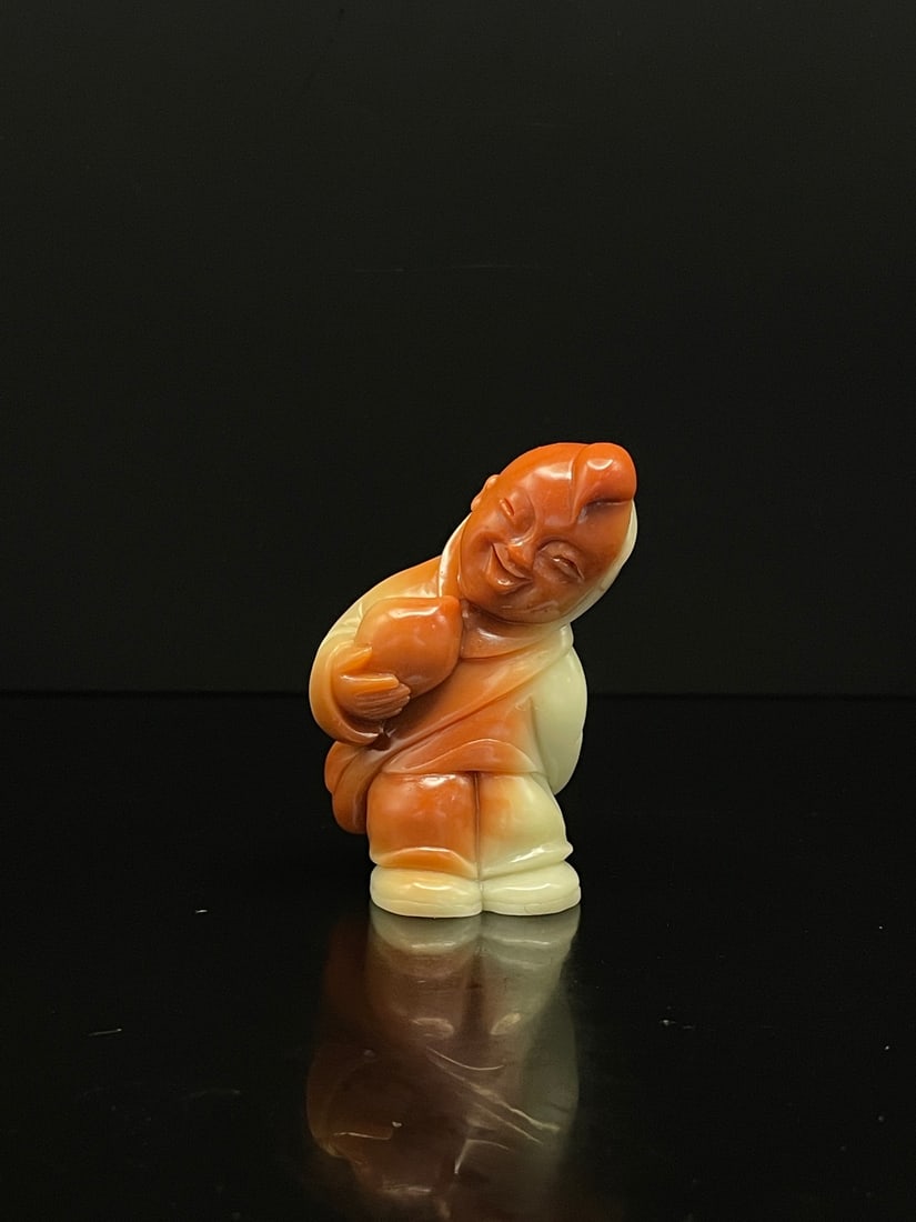 A Fine Furong Stone Ornament With Skillful?Carved Boy Holding Peach (1 of 9)