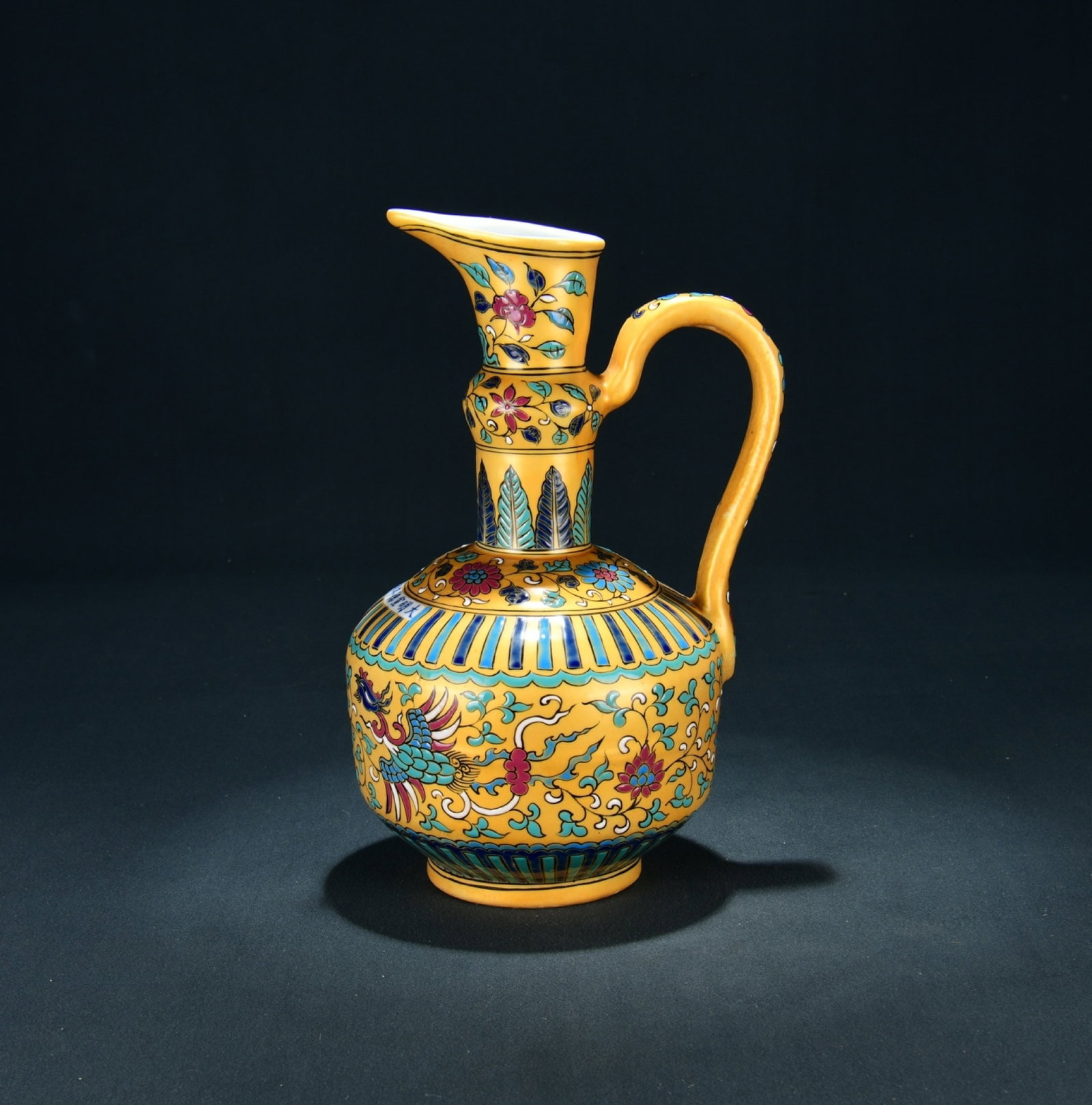 An Exquisite Gold Ground Wucai Ewer With Interlocking Twin Phoenix Patterns (1 of 9)