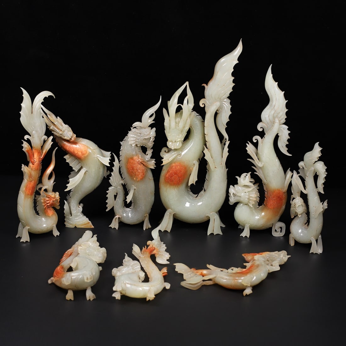 A Set Of Fine White Jade Auspicious Beast Ornaments: A Set Of Fine White Jade Auspicious Beast Ornaments,Qing Dynasty,China,Dimensions:(Large)4.5inx1.8inx13in,(Small)3inx0.9inx9.1in,Weight:(Large)1418g,(Small)232g,一套白玉瑞