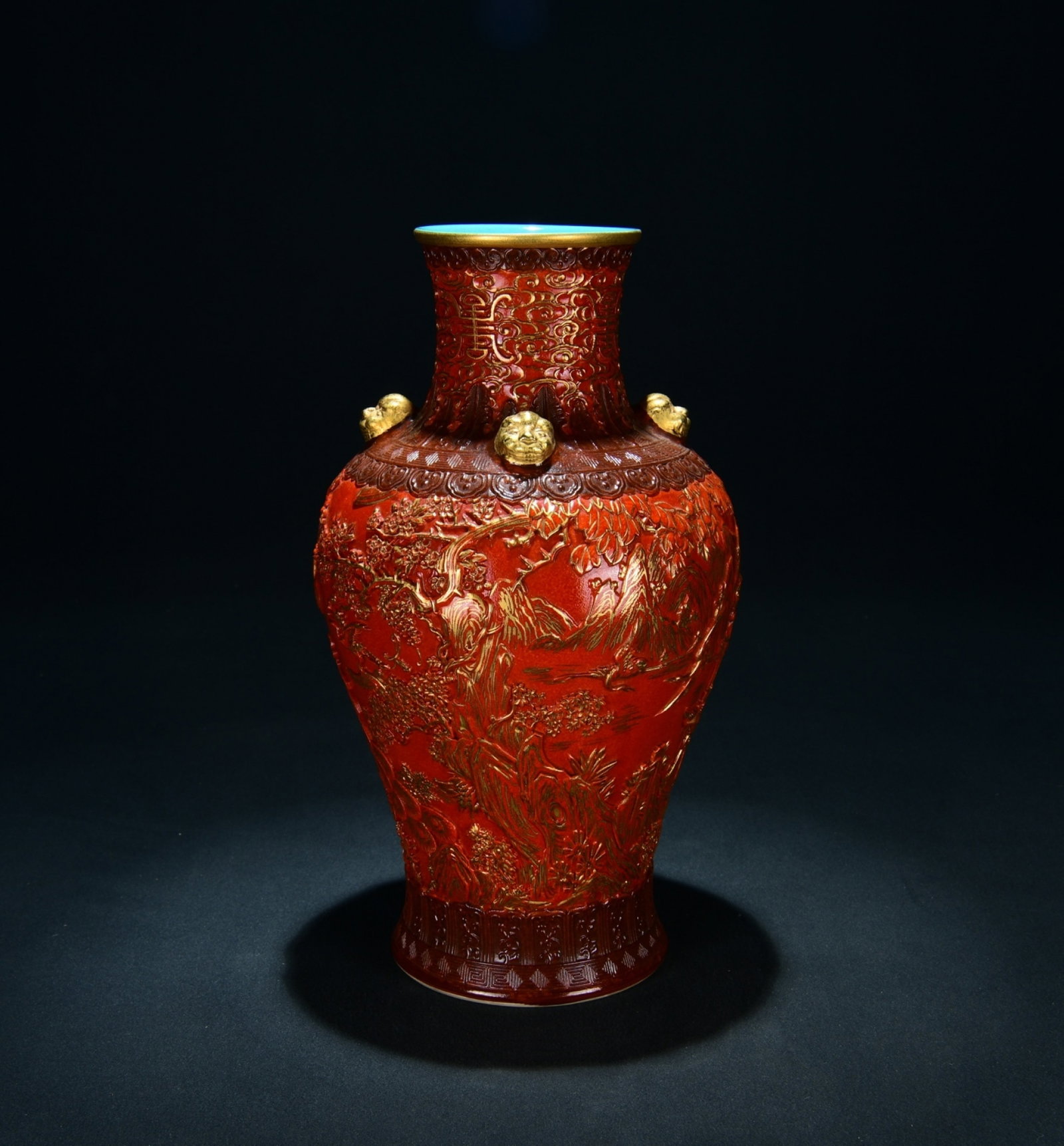 An Exquisite Coral Red Glaze Vase Carved With Landscape And Peacock Patterns: An Exquisite Coral Red Glaze Vase Carved With Landscape And Peacock Patterns,Qing Dynasty China,Six-Character Qianlong Mark,Dimensions:11.8inx6.3in,珊瑚红釉雕刻