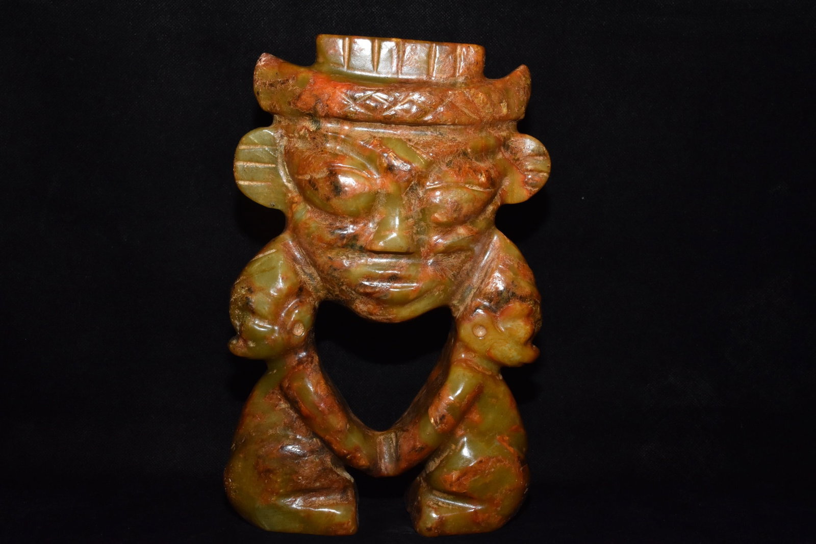 A Fine White Jade Hollow?Carved Deity Ornament: A Fine White Jade Hollow‑Carved Deity Ornament,Hongshan Culture,Dimensions:6.3inx 9.4in,Weight:3030g,白玉镂空神人摆件,红山文