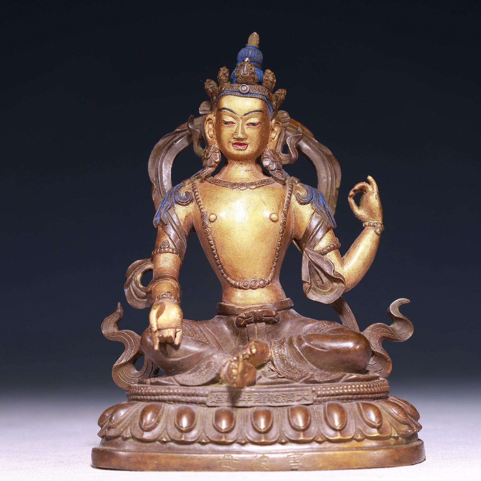 A Solemn Gilt Bronze Buddha Statue: A Solemn Gilt Bronze Buddha Statue,Qing Dynasty,China,Qianlong Mark,Size:3.9inx2.8inx5.7in,Weight:950g 铜鎏金佛像,中国清代,乾隆款