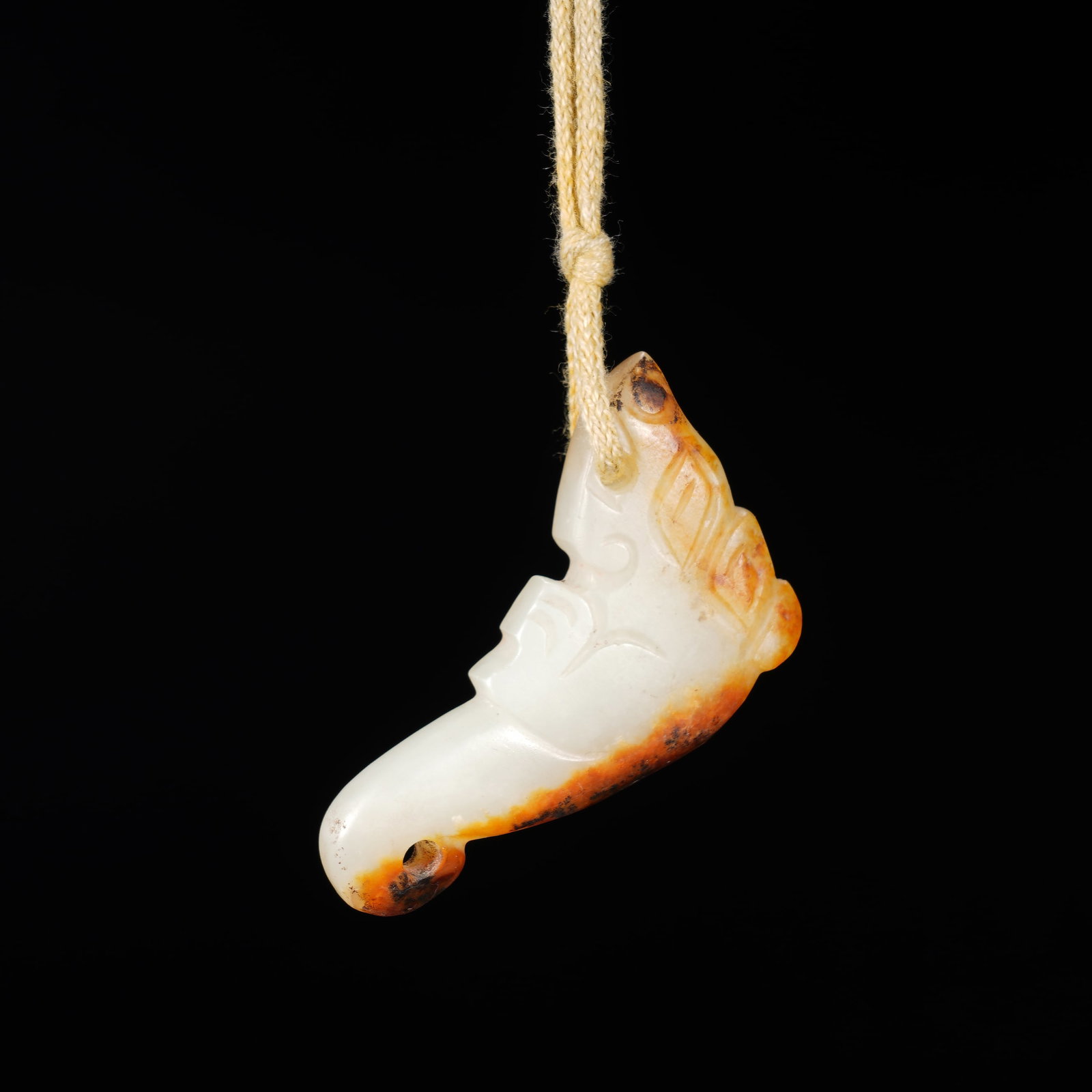 An Exquisite White Jade Pendant Preserving Natural Skin And With Jade Patina: An Exquisite White Jade Pendant Preserving Natural Skin And With Jade Patina,Han Dynasty,China. Dimensions:2inx1.4inx0.3in.
