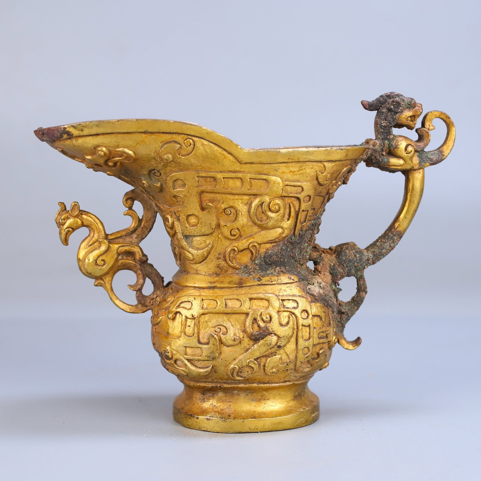 An Exquisite Gilt Bronze Cup With Dragon And Phoenix Ears And Carved Taotie Patterns (1 of 10)