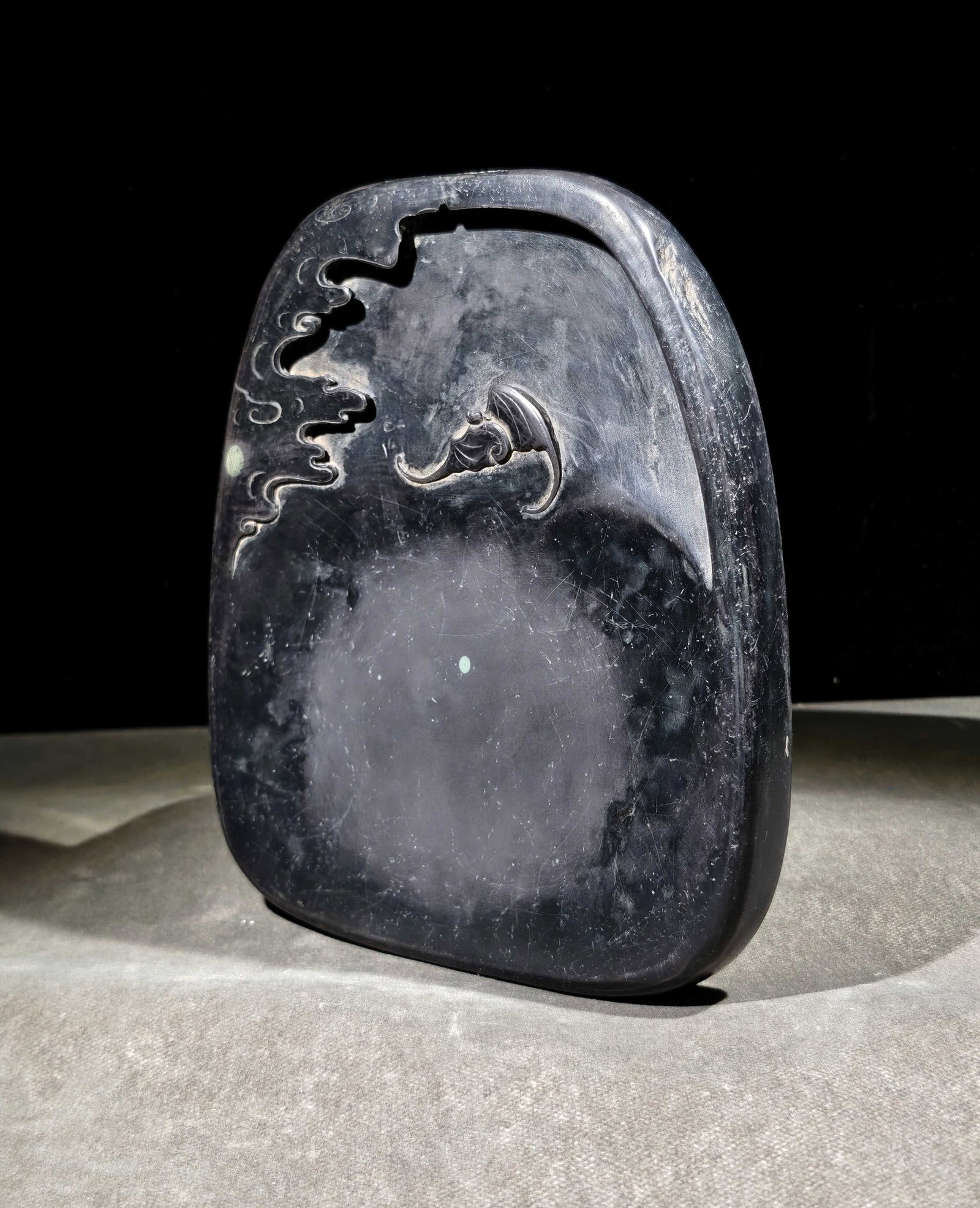 A Fine Duanshi Free?Form Inkstone With Cloud?And?Bat Motif: A Fine Duanshi Free‑Form Inkstone With Cloud‑And‑Bat Motif,China,Qing Dynasty,Mark Of Zheng Xie,Dimensions:8.3inx7.1inx1.1in,端石云蝠随形砚,