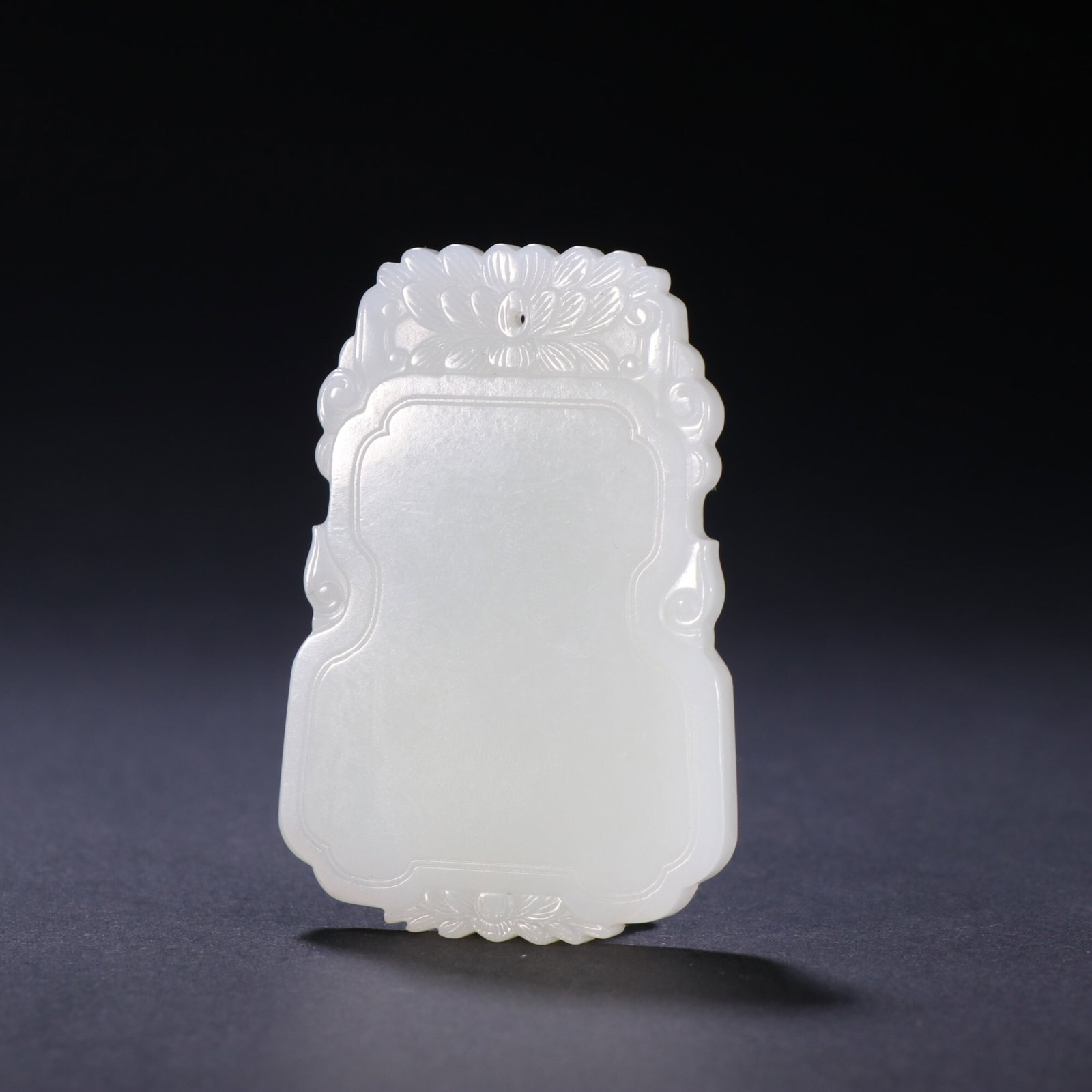 An Exquisite White Jade Plain Plaque With Lotus Motif (1 of 9)