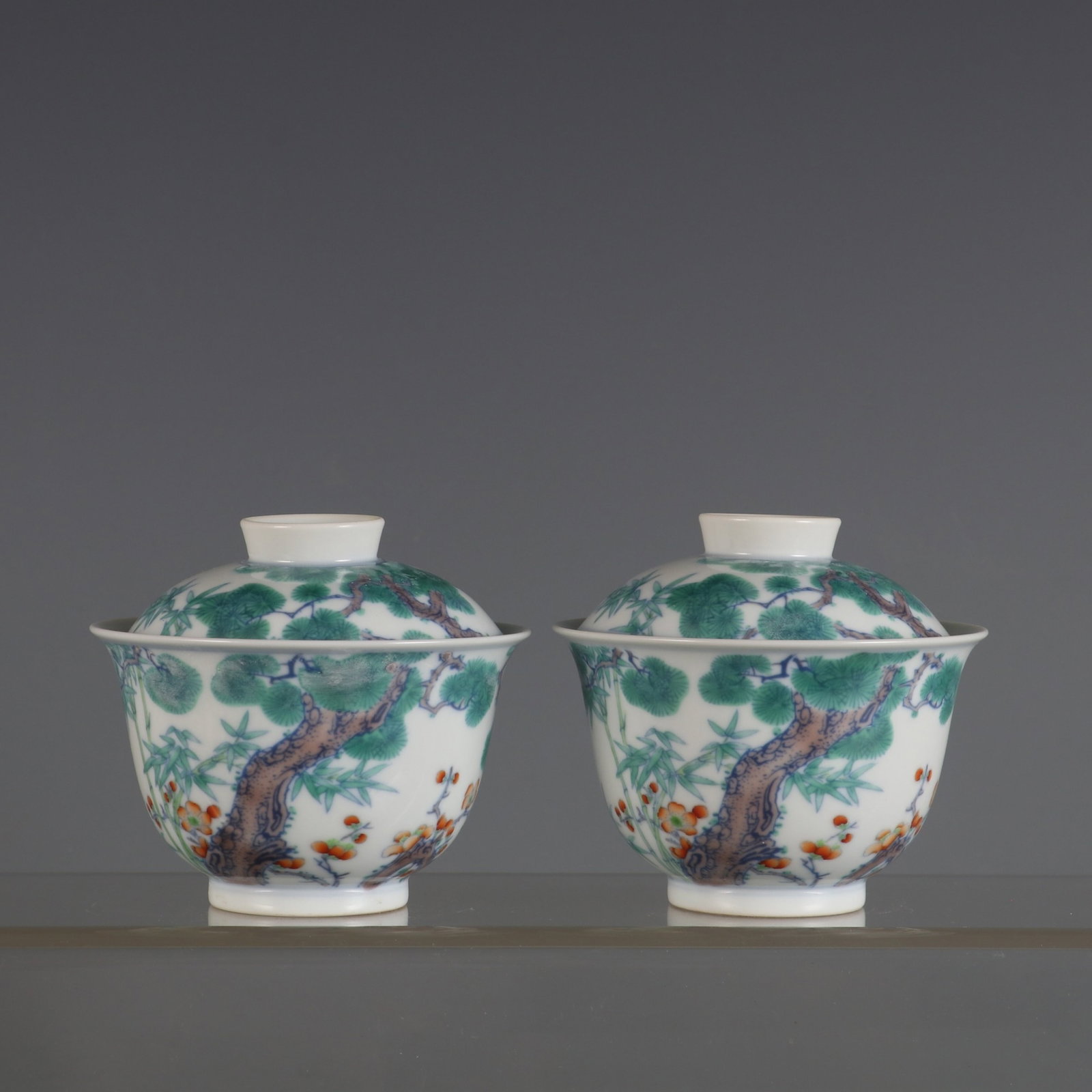 A Pair of Exquisite doucai three friends of winter lidded bowls,: A Pair of Exquisite doucai three friends of winter lidded bowls,Qing Dynasty, China,Yongzheng Six-character Mark,Size:2.9inx3.3in,一对斗彩岁寒三友௢