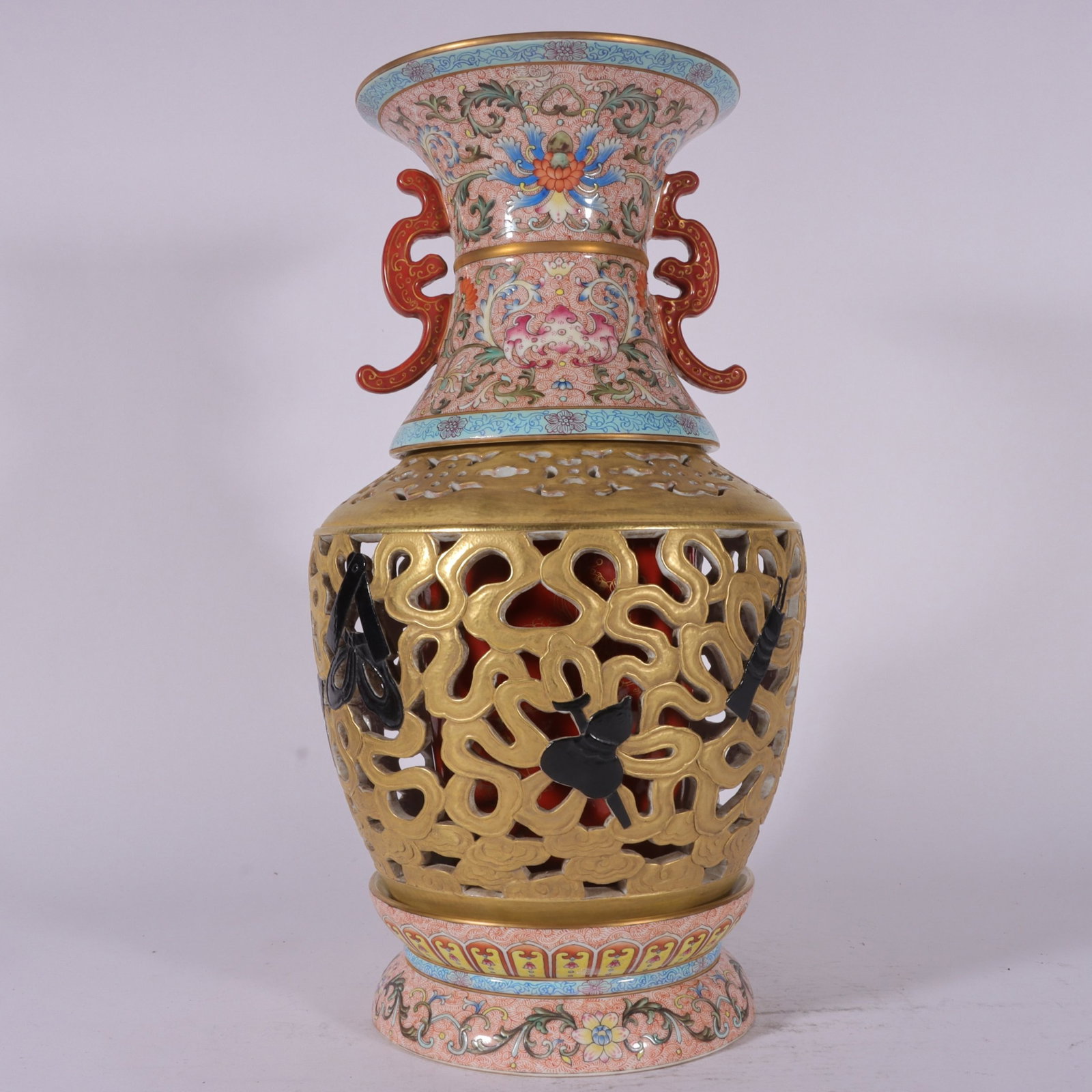 A Fine Famille Rose Gilded Ground Hollowed Eight Treasures Revolving Vase with Fern Patterns: A Fine Famille Rose Gilded Ground Hollowed Eight Treasures Revolving Vase with Fern Patterns,Qing Dynasty,China,Qianlong Six-character Mark,Size:15inx7.9in,粉彩凤尾草%