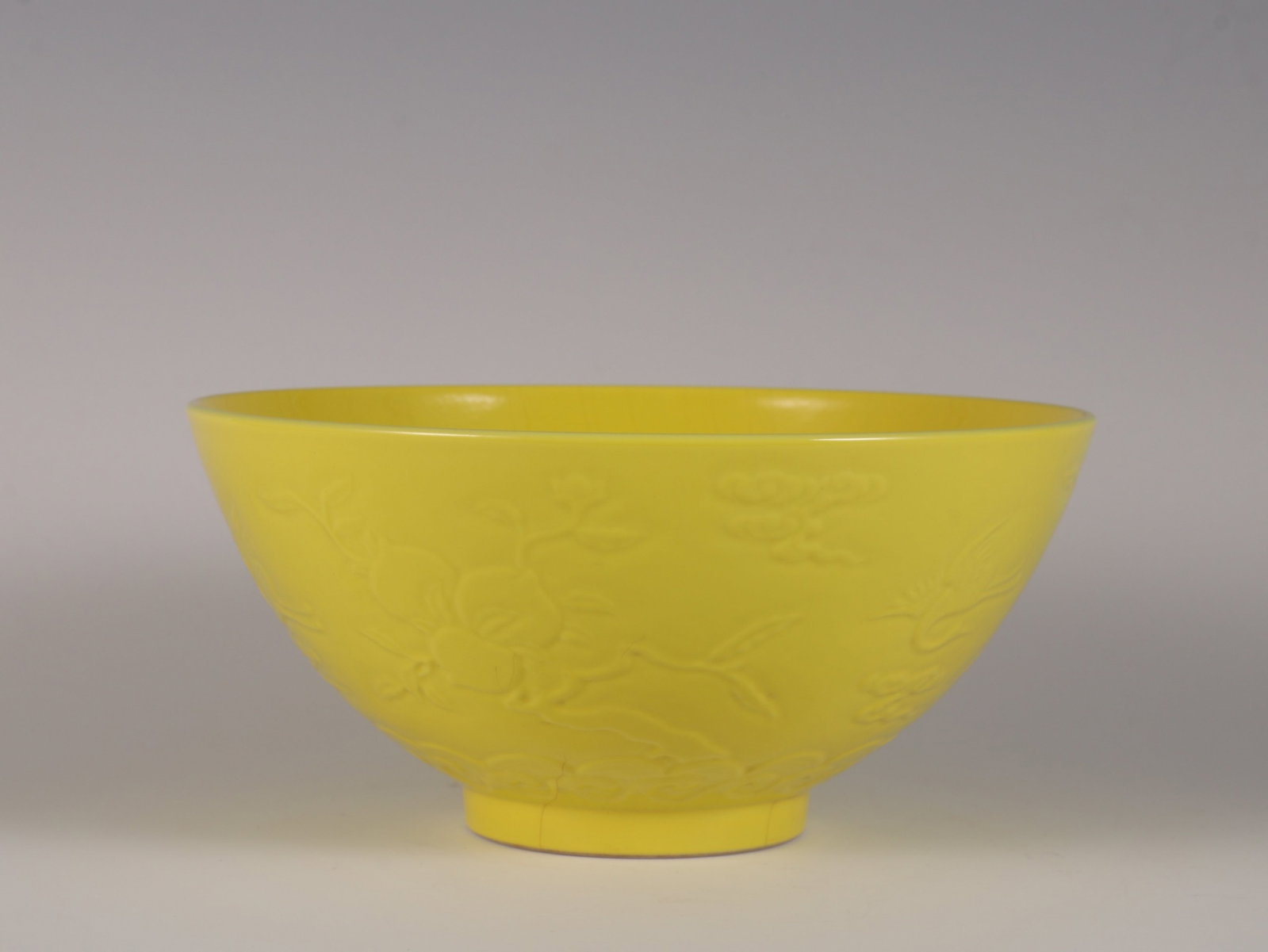 An Exquisite yellow glaze incised birthday celebration interior famille rose immortal peach bowl, (1 of 10)