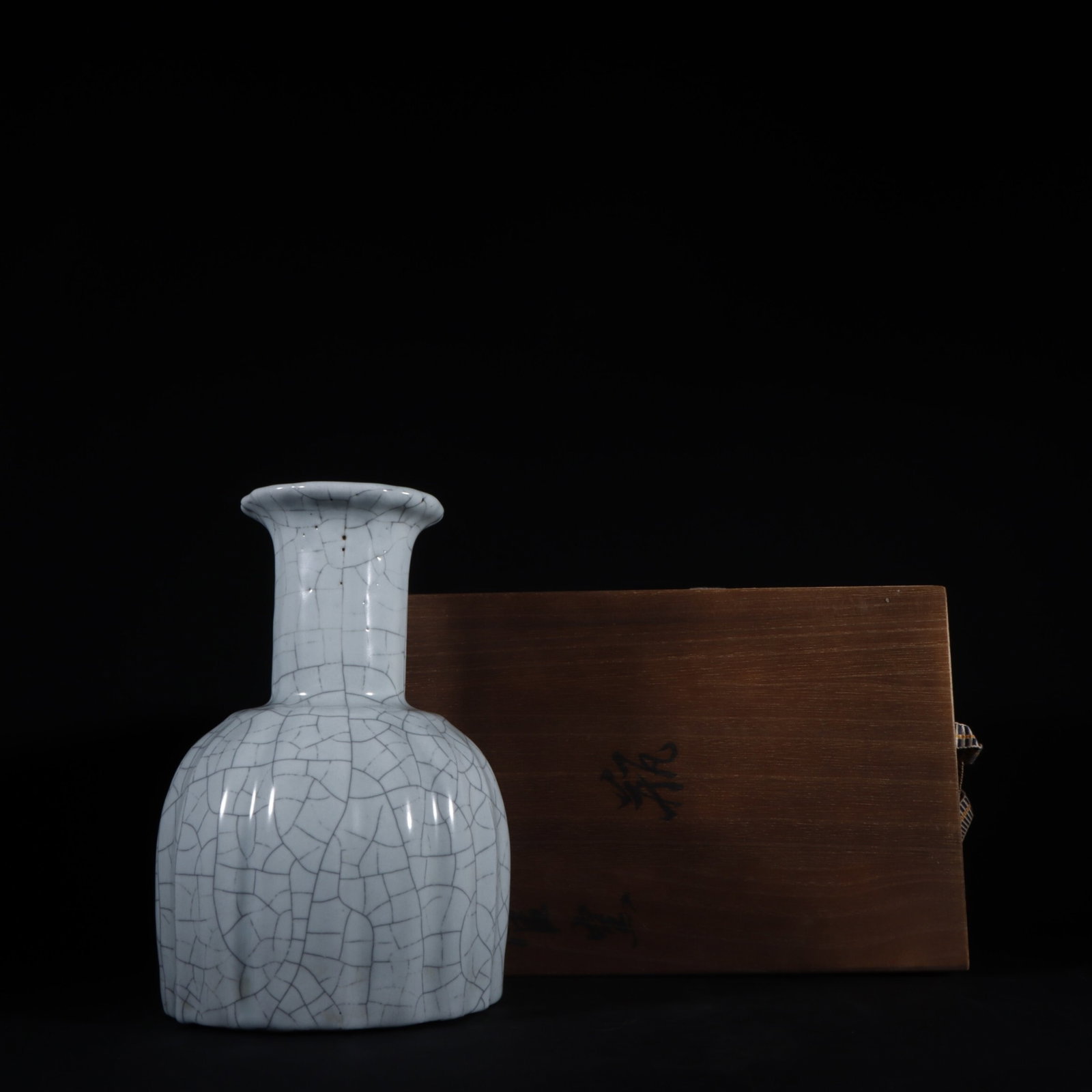 An Exquisite Guan Kiln Moon White Glaze Multi-Faceted Vase: An Exquisite Guan Kiln Moon White Glaze Multi-Faceted Vase,Song Dynasty,China,Size:8.5inx5.7in,官窑月白釉多棱瓶,中国宋代,尺
