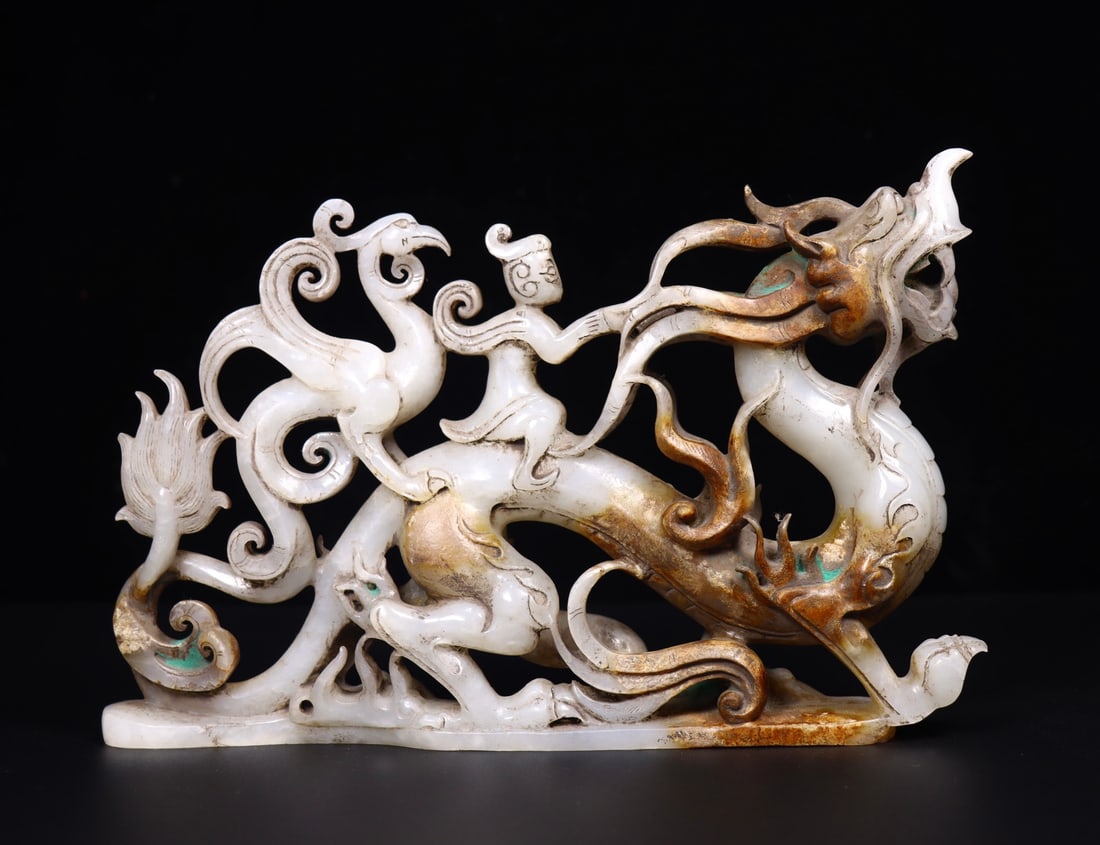 A Fine White Jade Ornament Depicting Immortal Riding Dragon And Guiding Phoenix (1 of 9)