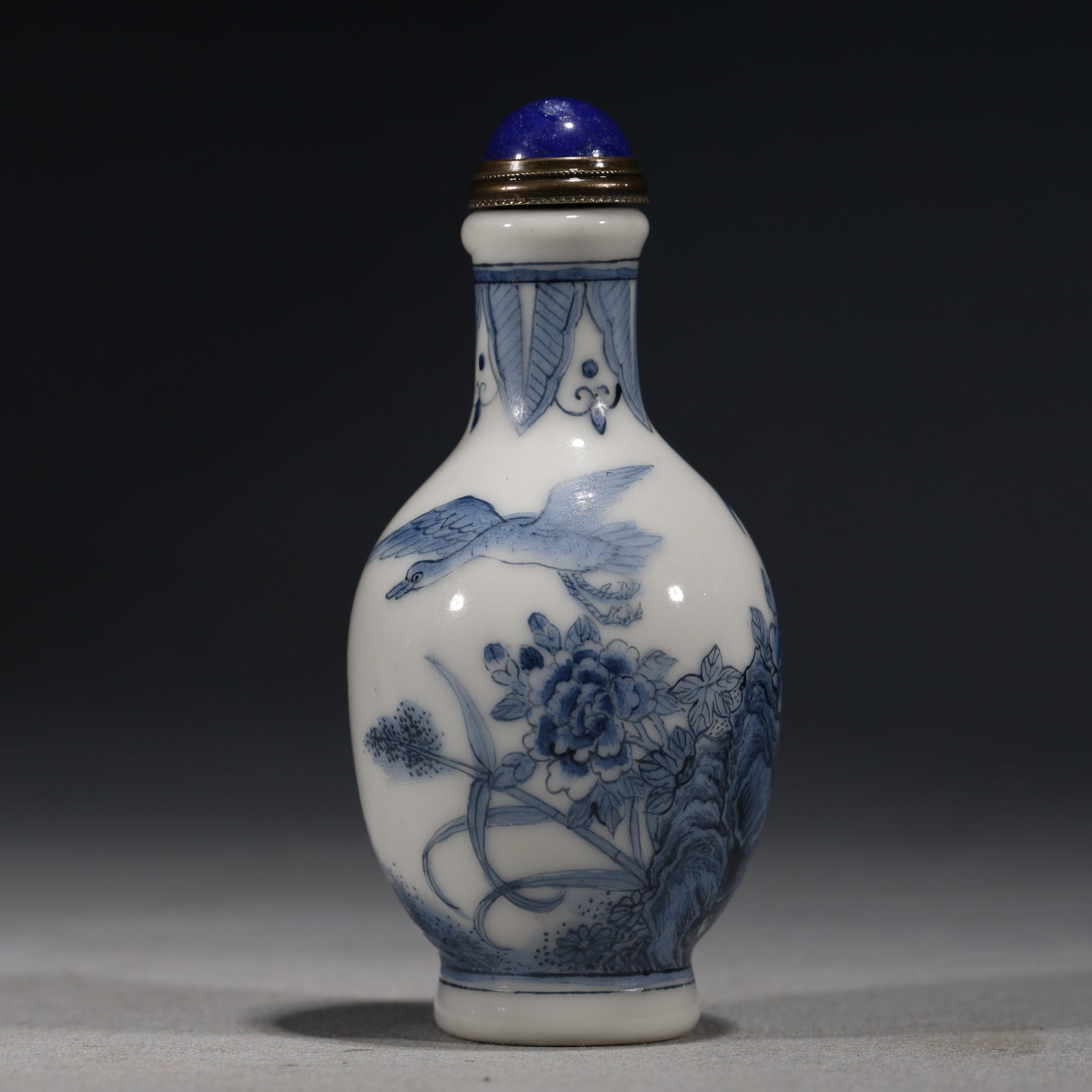 A Chinese Blue and White Porcelain Ovoid Snuff Bottle with Birds and Lotus,Qianlong Mark (1 of 7)