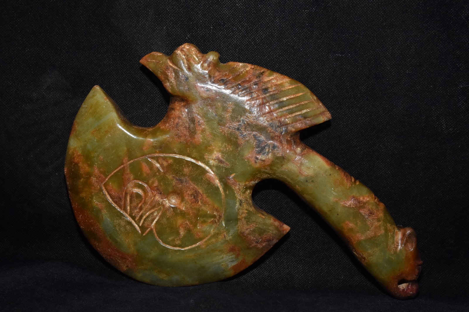A Fine White Jade Dragon?Head Axe Ornament: A Fine White Jade Dragon‑Head Axe Ornament,Hongshan Culture,Dimensions:9.8inx 6.7in,Weight:1740g,白玉龙首玉斧摆件,红山文化
