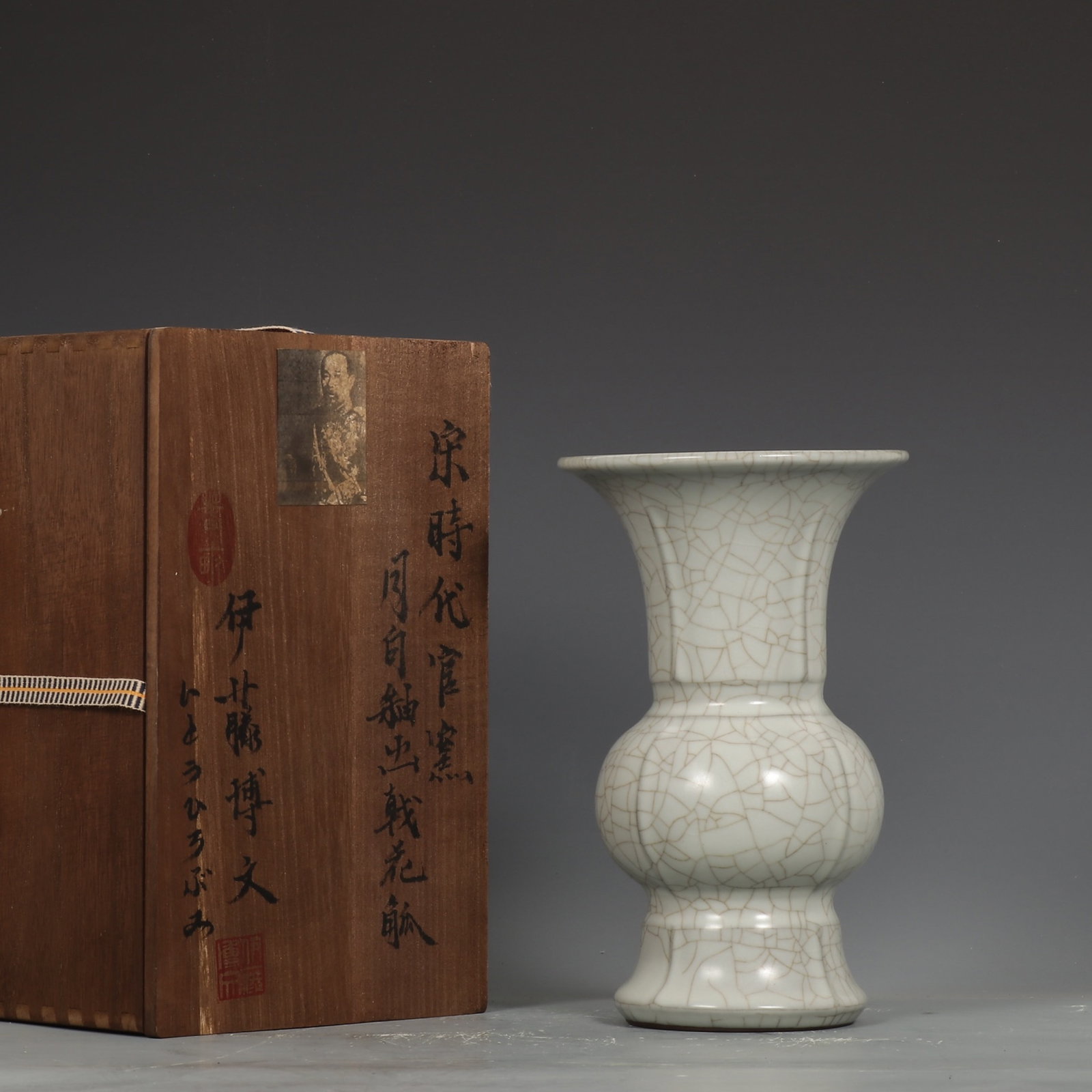 An Exquisite Guan Kiln Moon-White Glaze Ji Floral Gu Vase (1 of 9)