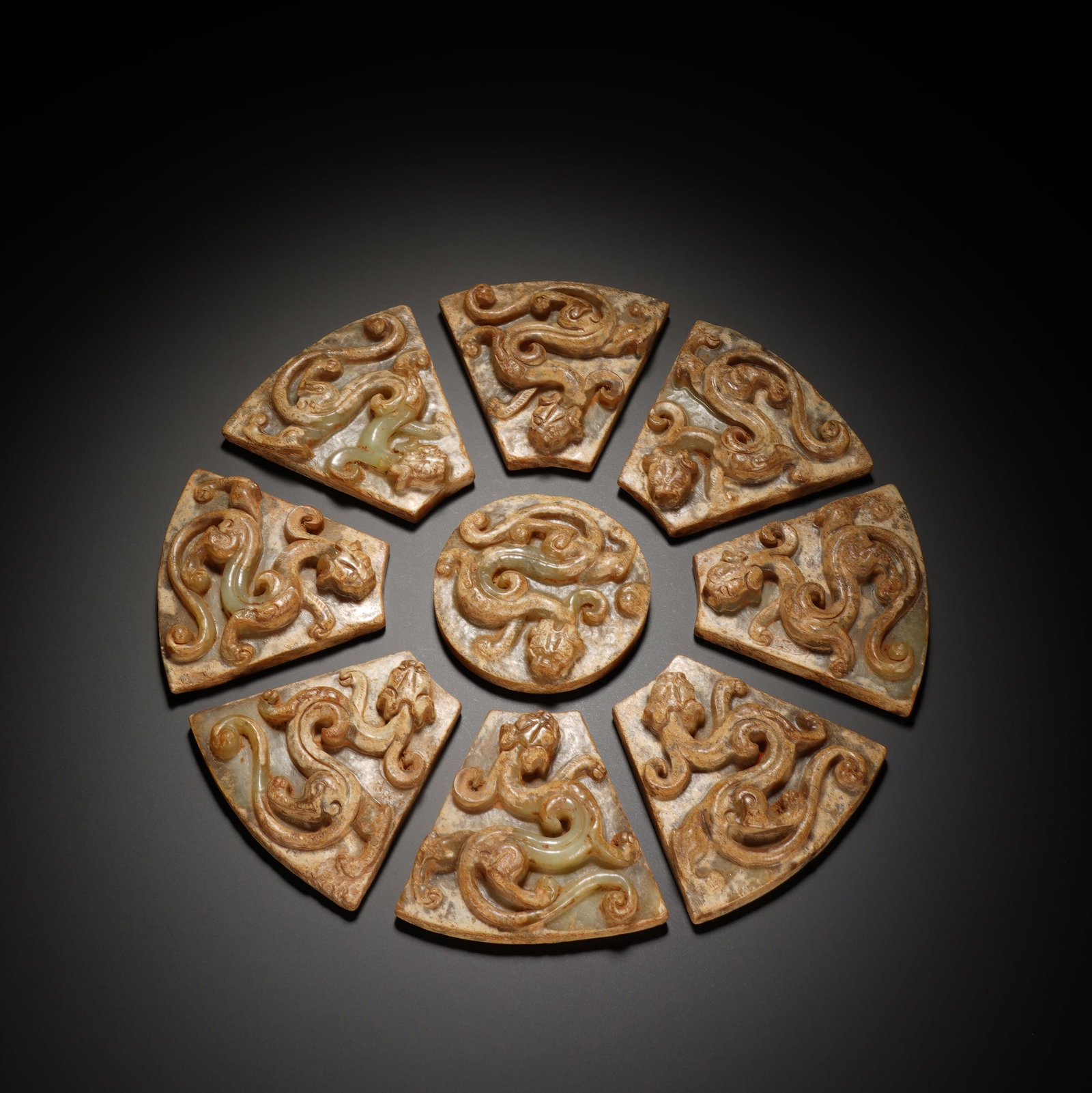 A Set Of Exquisite Nine Combined White Jade Bi Discs Carved With Chilong Patterns: A Set Of Exquisite Nine Combined White Jade Bi Discs Carved With Chilong Patterns,China,Warring States Period,Dimensions:6.7inx0.6in,Weight:592g,一套白玉螭龙纹