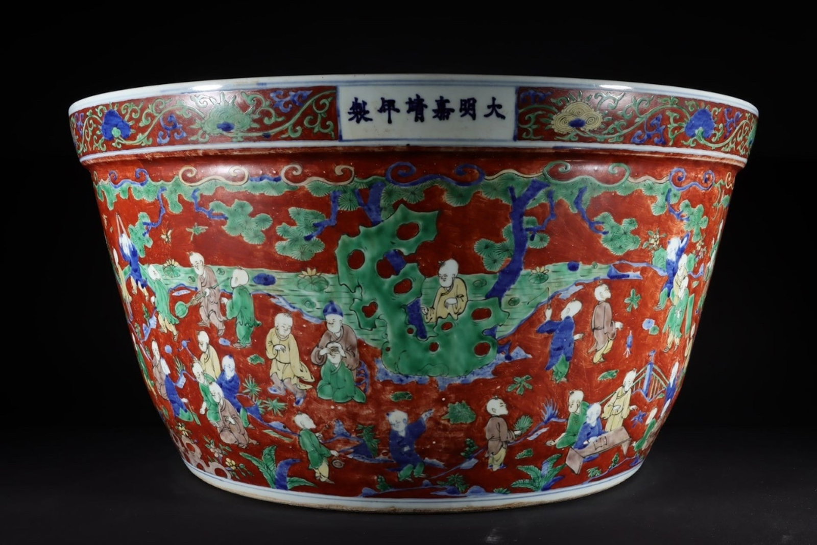 A Fine Red-ground Basin With Underglaze Blue,Yellow & Green Overglaze Motifs: A Fine Red-ground Basin With Underglaze Blue,Yellow & Green Overglaze Motifs,Ming Dynasty,China,Jiajing Six-character