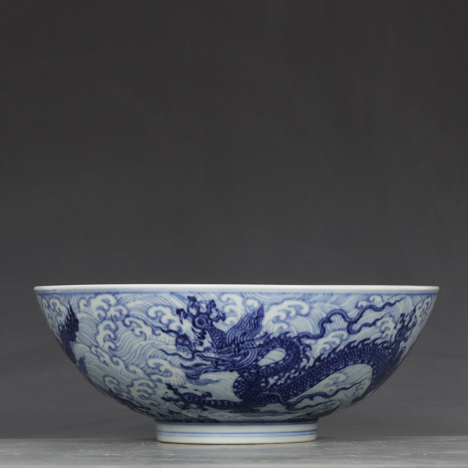 An Exquisite Blue And White Bowl With Dragon Over Sea Wave Patterns: An Exquisite Blue And White Bowl With Dragon Over Sea Wave Patterns,Ming Dynasty,China,Xuande Six-character