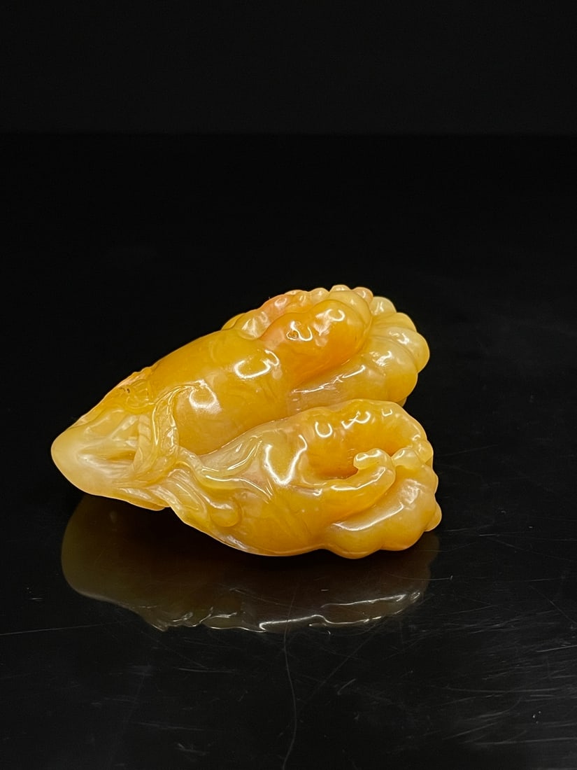 A Fine Tianhuang Stone Fully?Carved Buddha?Hand Citron Hand Piece: A Fine Tianhuang Stone Fully‑Carved Buddha‑Hand Citron Hand Piece,Qing Dynasty Of China,Dimensions:2.2inx1.2inx2.5in,Weight:83g,田黄石圆雕佛手