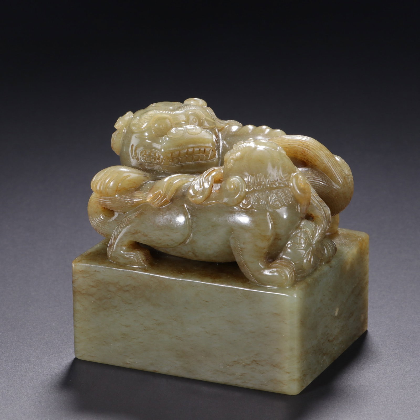 A Fine Celadon Jade Seal With Double?Lion Knob: A Fine Celadon Jade Seal With Double‑Lion Knob,China,Qing Dynasty,Dimensions:3inx3in,青玉双狮钮印章,中国清代