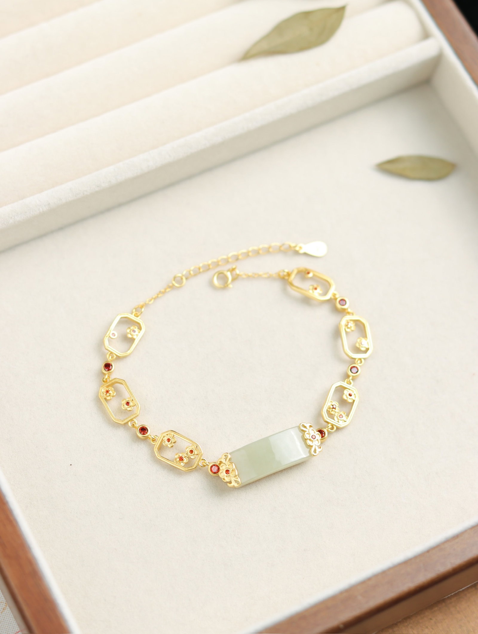 An Exquisite Jadeite Avalokitesvara Pattern Pendant: An Exquisite Sterling Silver-Gold Plated Inlaid White Jade Bracelets,Inlaid Diamond 纯银镀金镶白玉手链,嵌钻石