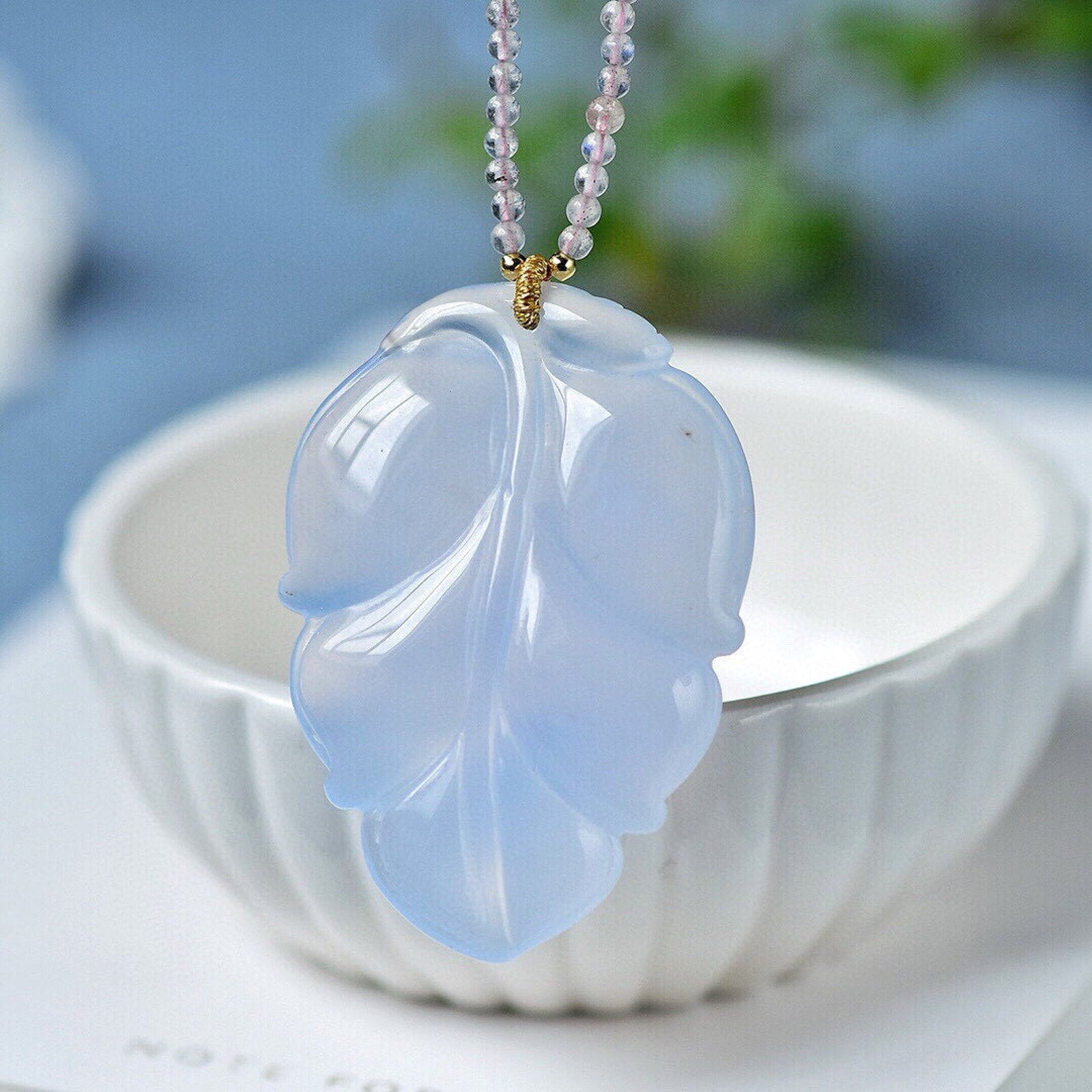 A Pair of Exquisite Sterling Silver-Gold Plated Inlaid White Jade Earrings: An Exquisite Blue Chalcedony Leaf-Shaped Pendant,Size:47.6mmx33.2mmx7.7mm,Weight:16.8g 蓝玉髓树叶形吊坠