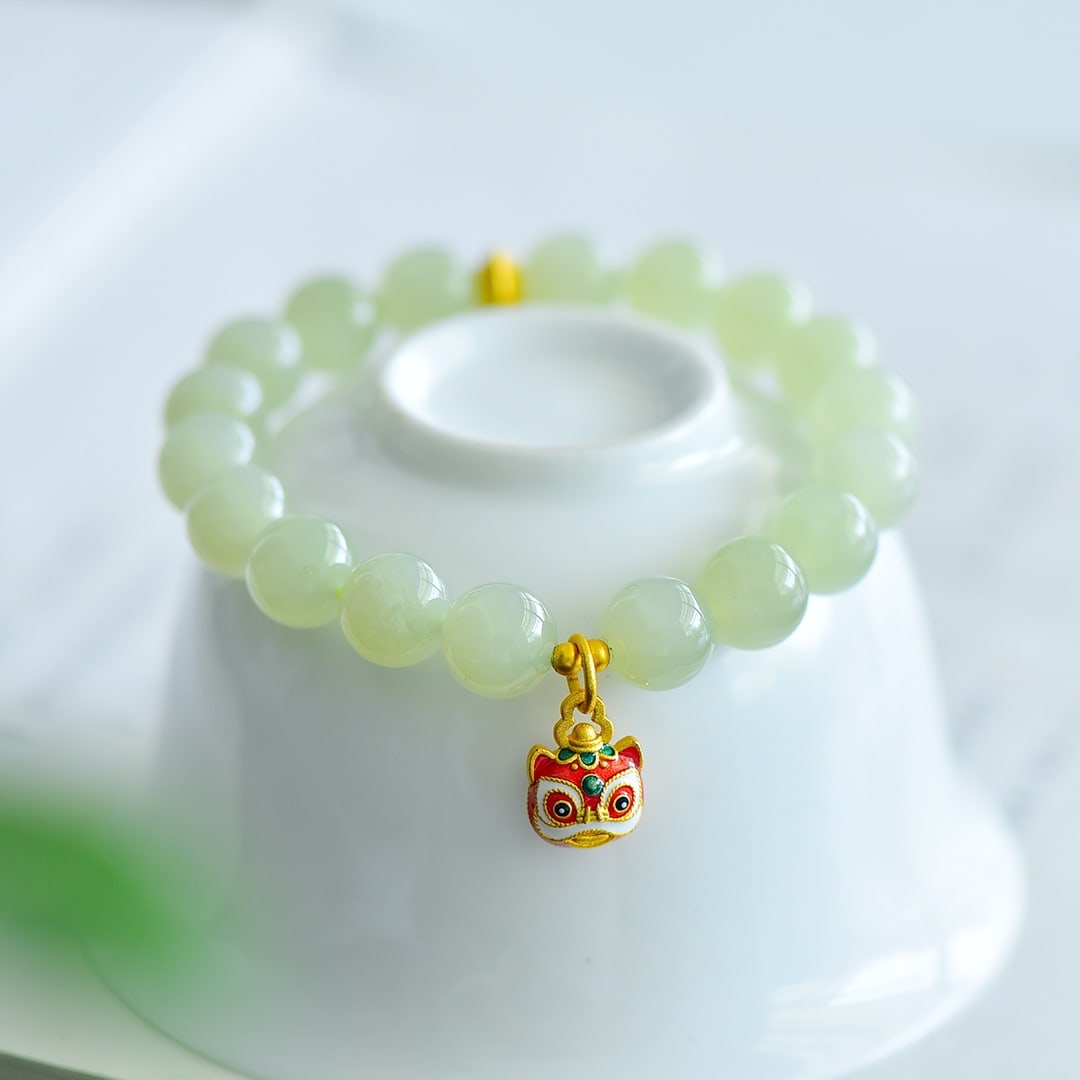 An Exquisite White Jade Bracelets: An Exquisite Greenish Jade Bracelets,Size:10mm 青白玉手串