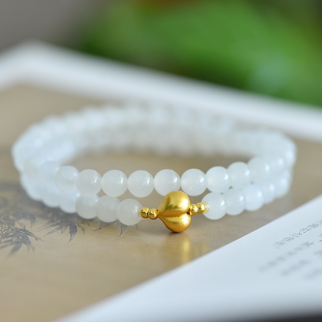 An Exquisite Greenish Jade Fish Pattern Pendant: An Exquisite White Jade Bracelets 白玉手串