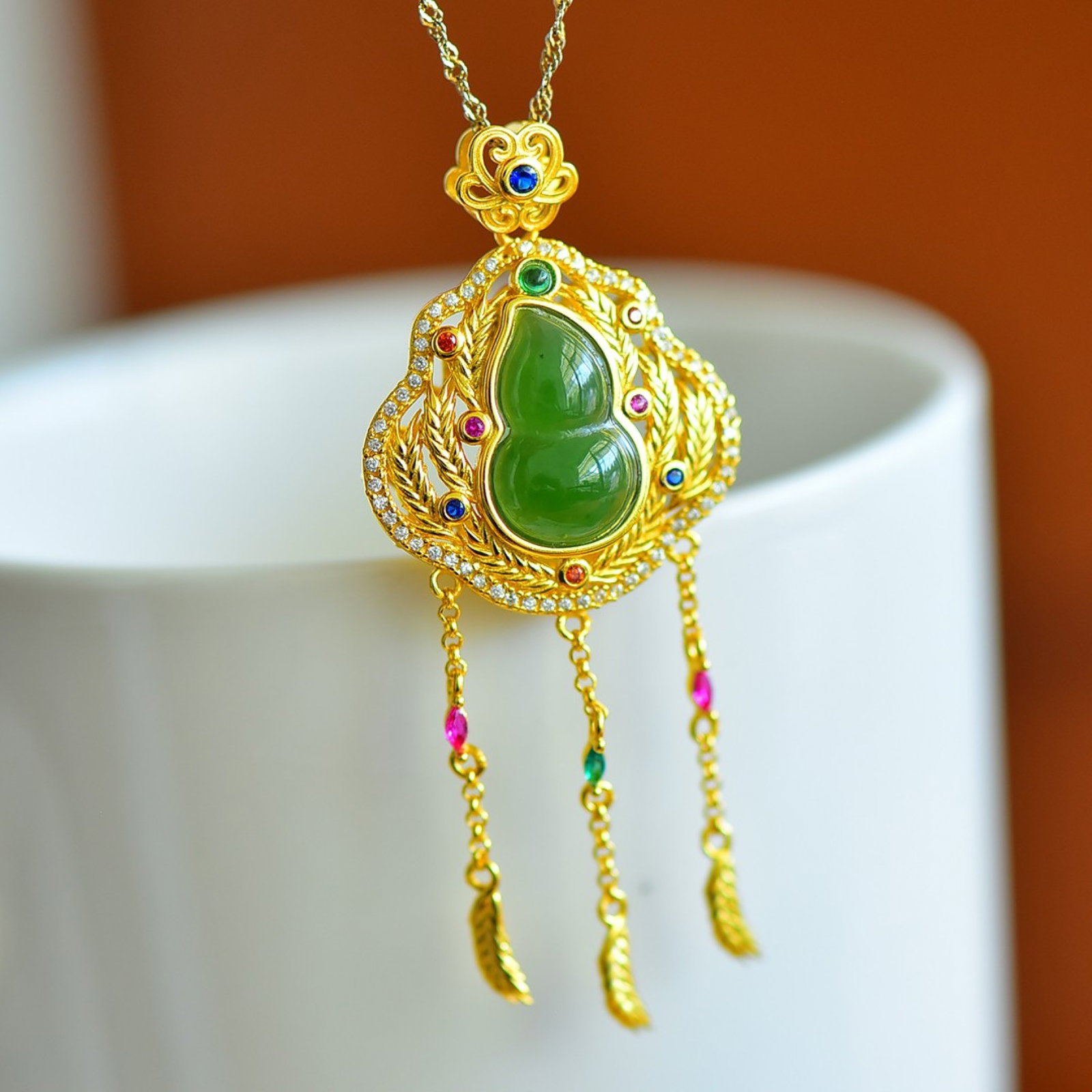A Pair of Exquisite Sterling Silver-Gold Plated Inlaid Agate Earrings: An Exquisite Sterling Silver-Gold Plated Inlaid Jasper Gourd Pendant,Inlaid Diamond,Size:9mmx15mm
