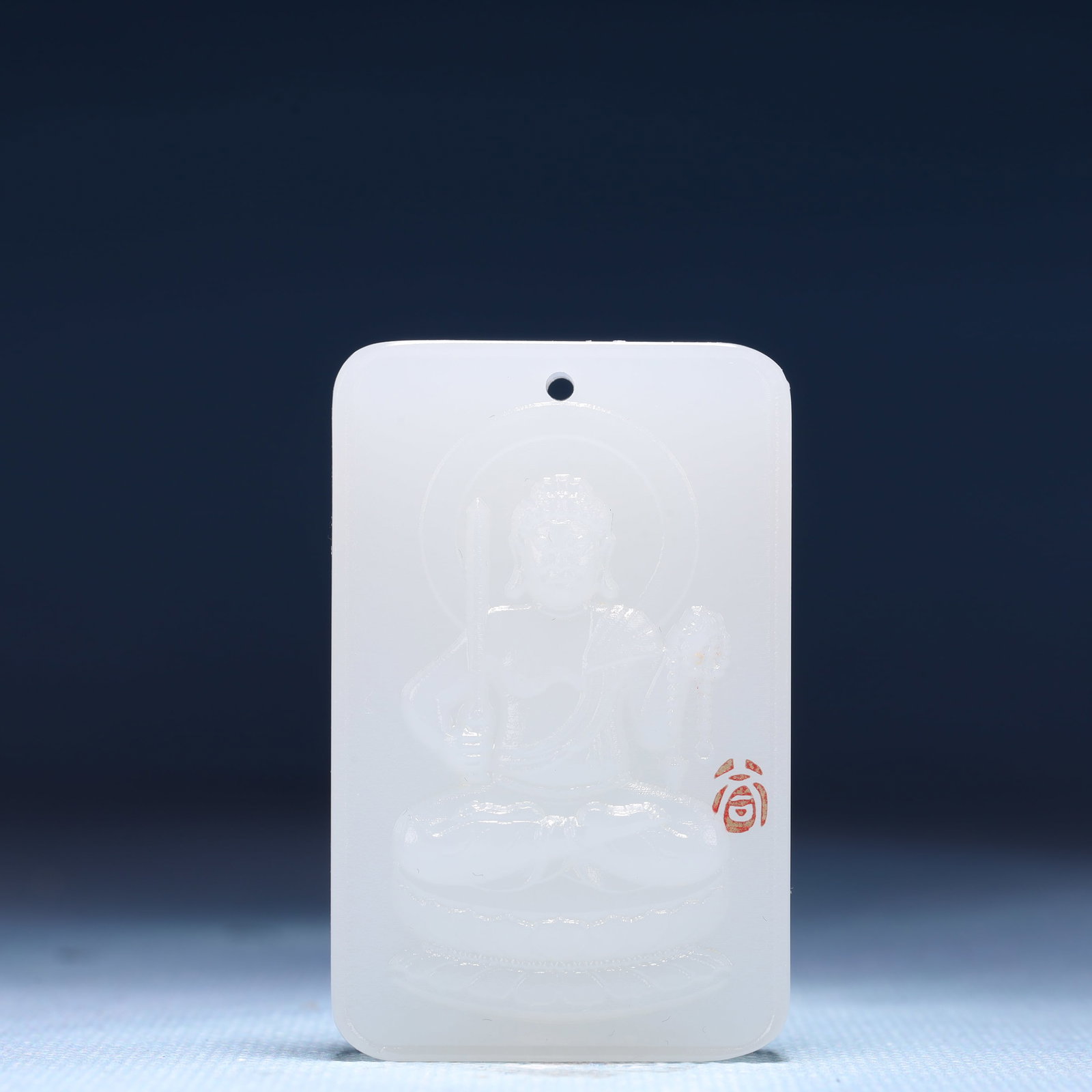 An Exquisite Dzi Bead Pendant, Inlaid Bronze Roc: An Exquisite White Jade Statue of Manjusri Pendant,Size:3.5cmx1cmx5.5cm,Weight:48g 白玉文殊菩萨像牌