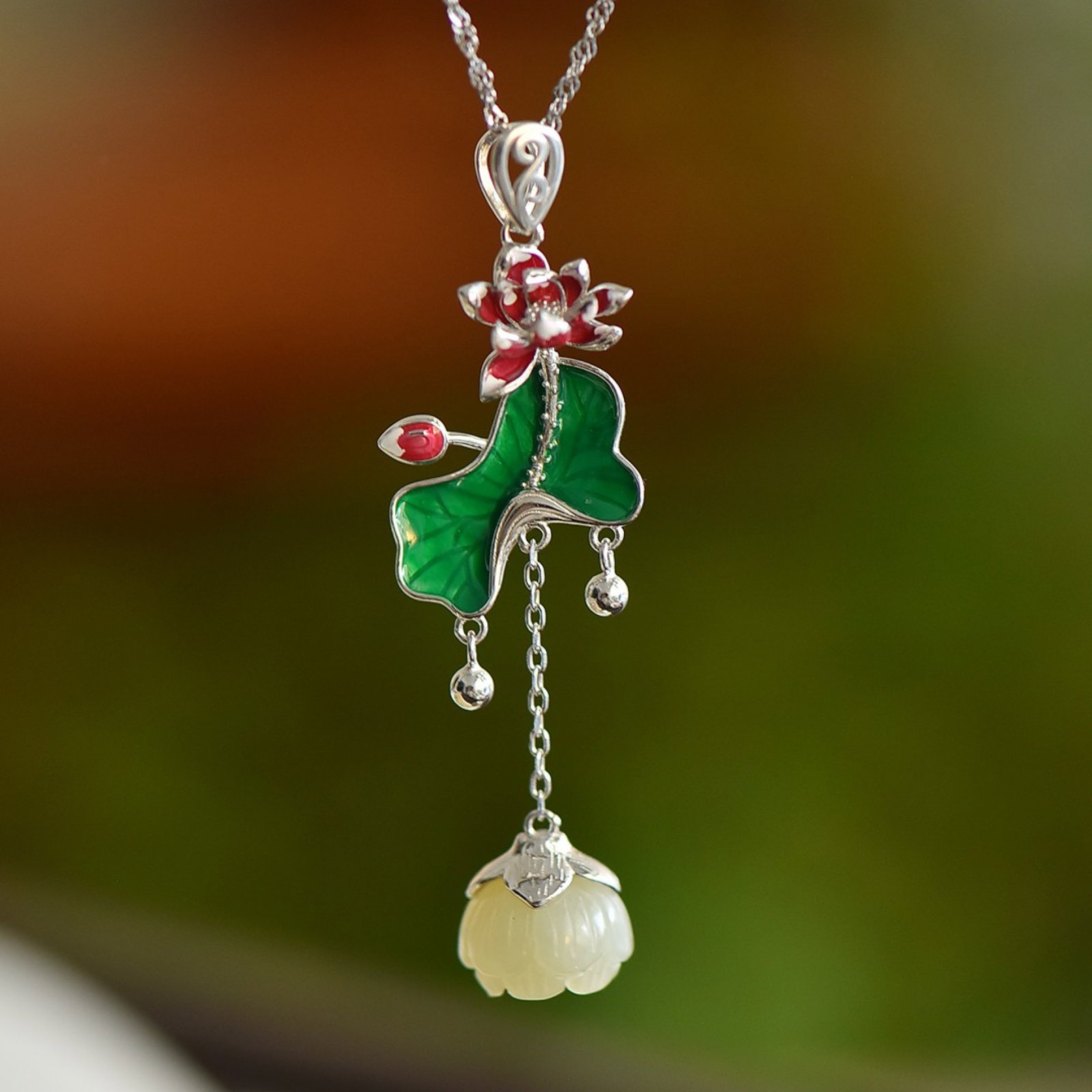 An Exquisite Sapphire Maitreya Buddha Pattern Pendant: An Exquisite Sterling Silver Inlaid White Jade Pendant,Size:12mmx12mm 纯银镶白玉吊坠