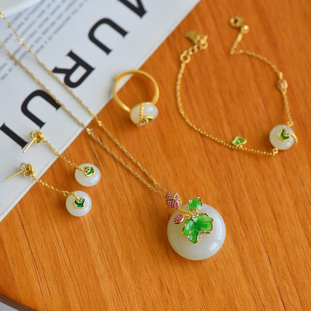 A Pair of Exquisite Sterling Silver-Gold Plated Inlaid White Jade Jewelry,Inlaid Gems: A Pair of Exquisite Sterling Silver-Gold Plated Inlaid White Jade Jewelry,Inlaid Gems,Size:(Bracelet)12mmx12mm,(Necklace)22mmx22mm,(Earrings)10mmx10mm,(Ring)10mmx10mm 一套纯银&