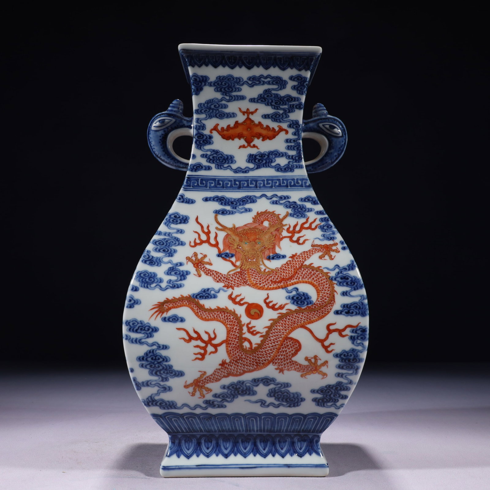 An Exquisite Blue and White Iron-Red Dragon and Phoenix Pattern Double-Ears Vase: An Exquisite Blue and White Iron-Red Dragon and Phoenix Pattern Double-Ears Vase 青花矾红龙凤纹双耳瓶,中国清代,È