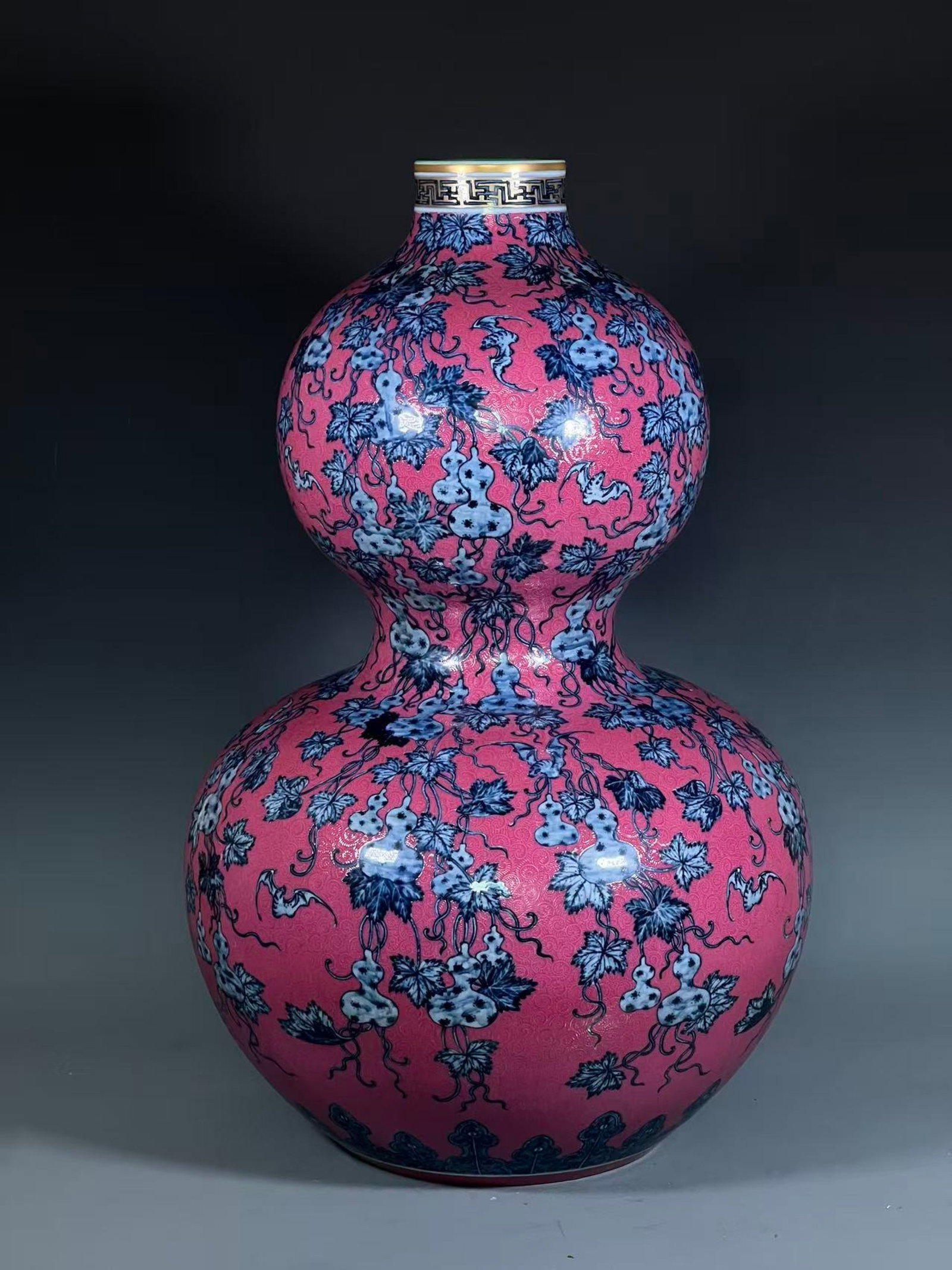 A Huge Ruby Red-Glazed Blue and White Painted Gold Gourd Pattern Gourd-Shaped Vase: A Huge Ruby Red-Glazed Blue and White Painted Gold Gourd Pattern Gourd-Shaped Vase,Qing Dynasty,China,Qianlong Six-character Mark,Size:26.2inx8.9in 胭脂红青花描%