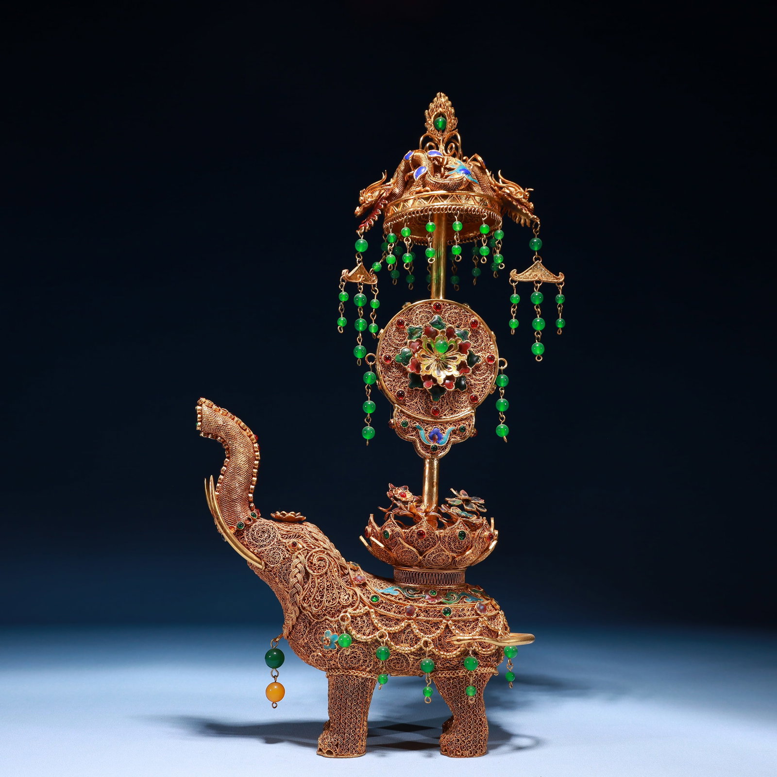 An Exquisite Filigree and Gilding Flower Pattern Elephant Ornament,Inlaid Jasper: An Exquisite Filigree and Gilding Flower Pattern Elephant Ornament,Inlaid Jasper,Qing Dynasty,China,Qianlong Four-character Mark,Size:8.7inx3.1inx1.2in,Weight:1100g 掐丝鎏金