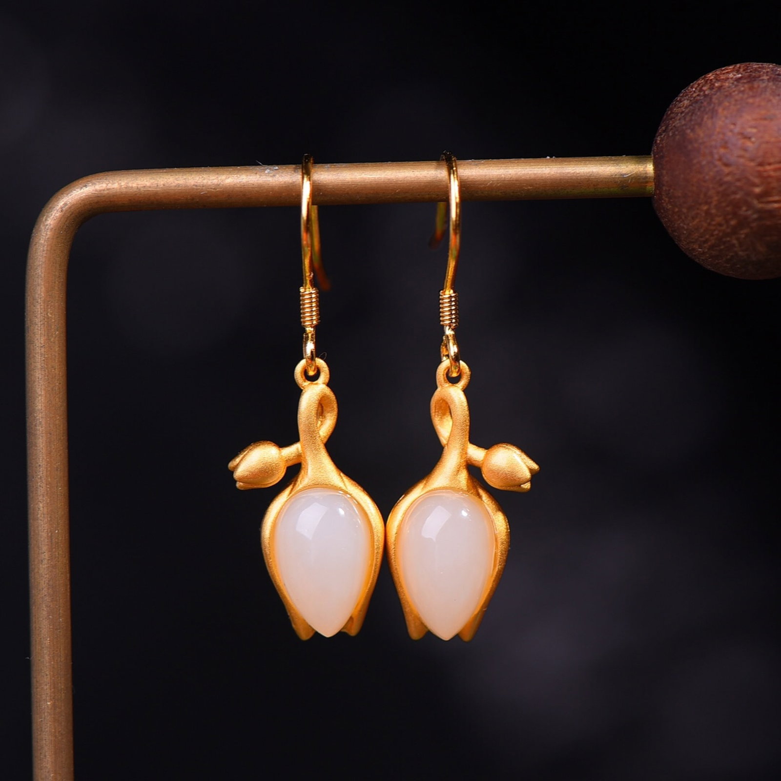 A Pair of Exquisite Sterling Silver-Gold Plated Inlaid White Jade Earrings: A Pair of Exquisite Sterling Silver-Gold Plated Inlaid White Jade Earrings,Size:7mmx11mm 一对纯银镀金镶白玉耳环