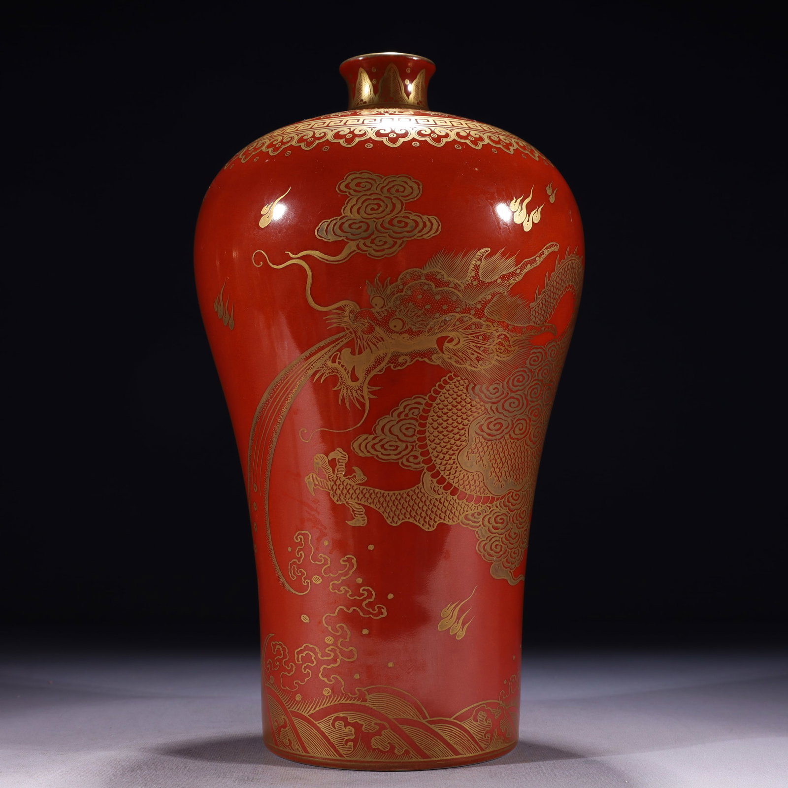 An Exquisite Red Glazed Painted Gold Auspicious Cloud and Dragon Pattern Vase: An Exquisite Red Glazed Painted Gold Auspicious Cloud and Dragon Pattern Vase,Qing Dynasty,China,Yongzheng Six-character Mark,Size:6.7inx13.8in,Weight:2400g