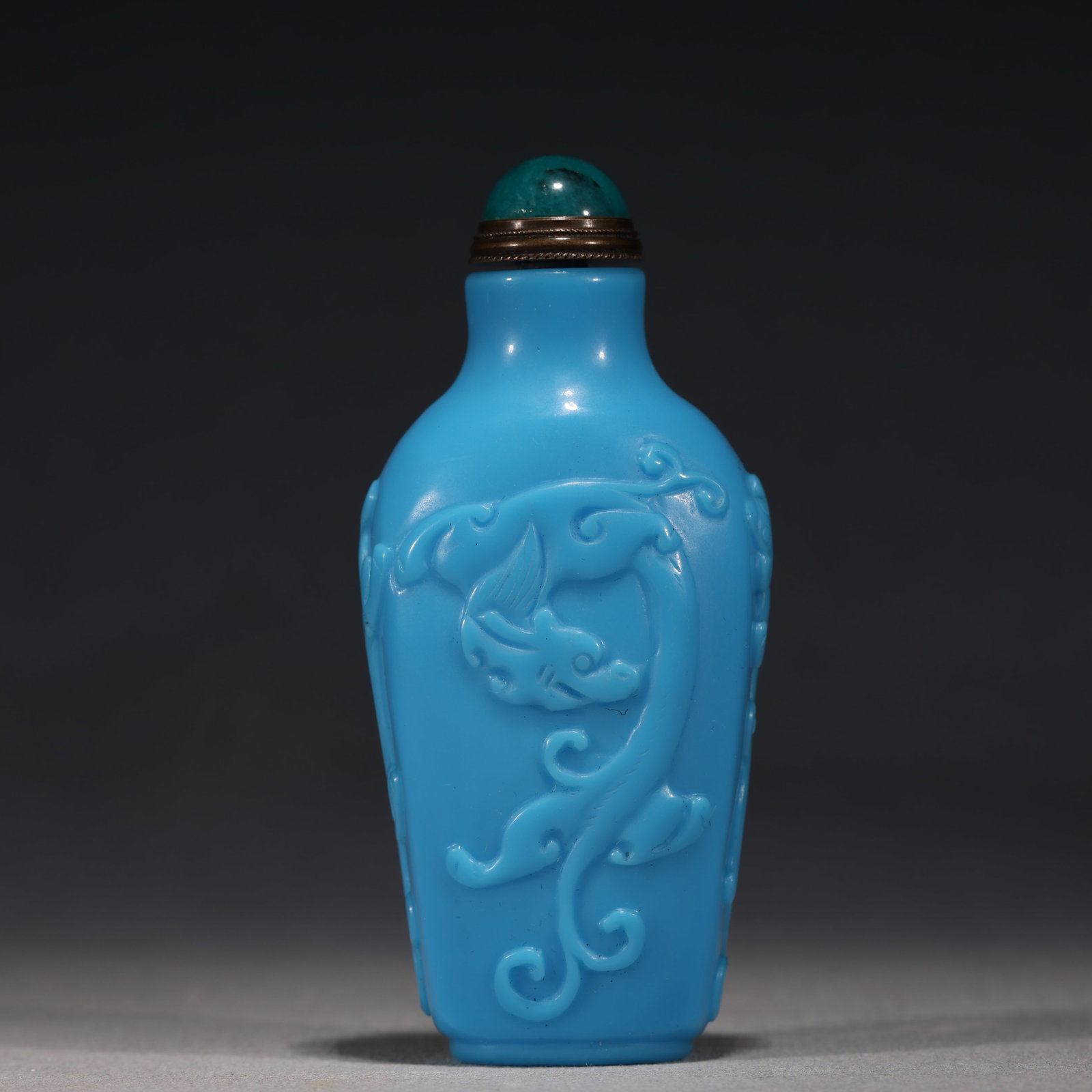 An Exquisite Sky-blue Glass Chilong Dragon Pattern Snuff Bottle: An Exquisite Sky-blue Glass Chilong Dragon Pattern Snuff Bottle,Qing Dynasty, China,Yongzheng Four-character Mark,Size:1.6in×1.2in×3.5in